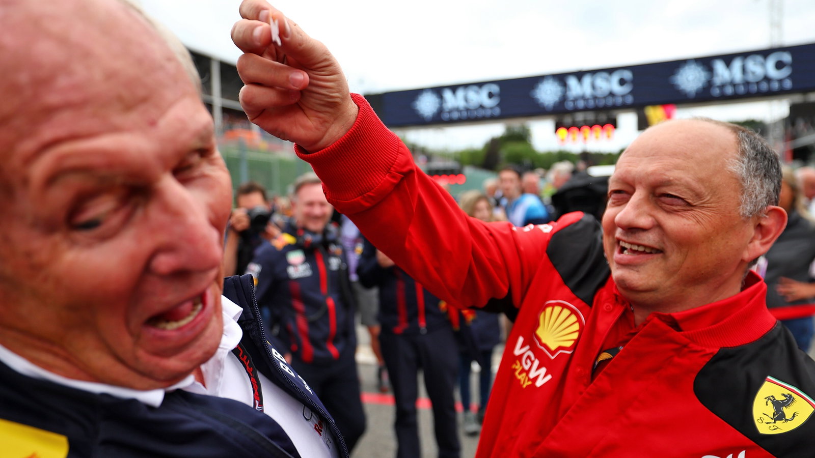 (L to R): Dr Helmut Marko (AUT) Red Bull Motorsport Consultant with Frederic Vasseur (FRA) Ferrari Team Principal on the