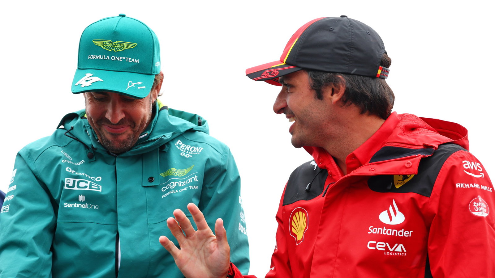 (L to R): Fernando Alonso (ESP) Aston Martin F1 Team and Carlos Sainz Jr (ESP) Ferrari on the drivers' parade. Formula 1