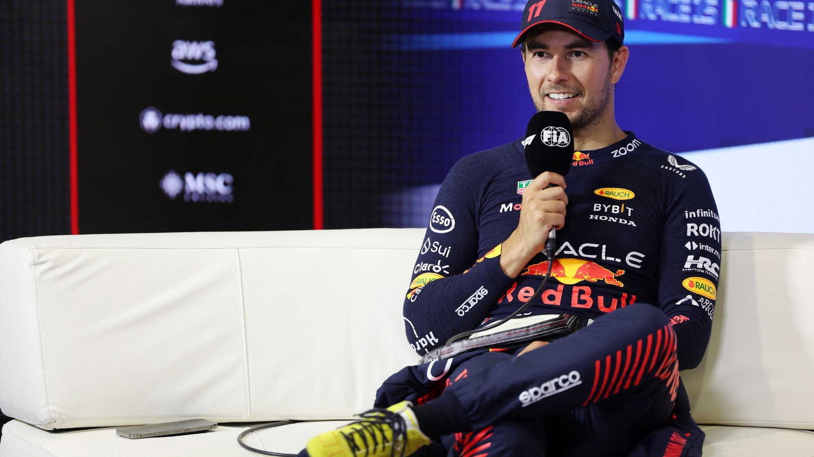 Sergio Perez (MEX) Red Bull Racing, in the post race FIA Press Conference. Formula 1 World Championship, Rd 15, Italian