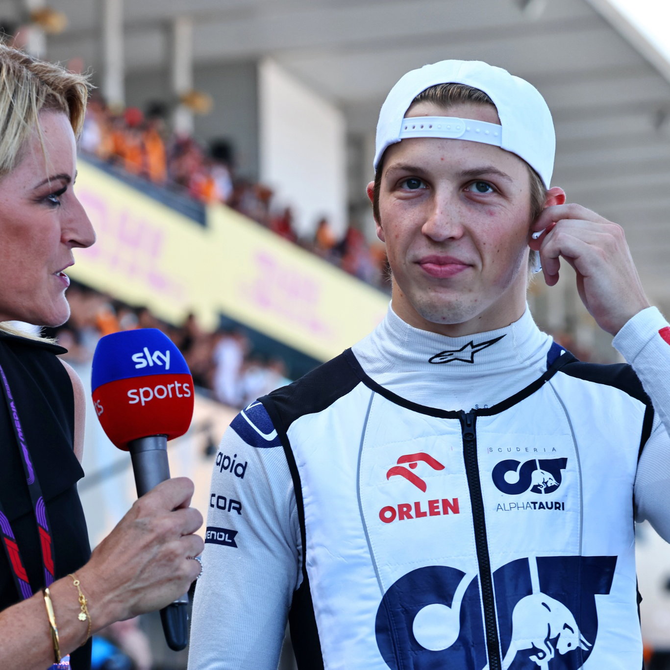 (L to R): Rachel Brookes (GBR) Sky Sports F1 Reporter with Liam Lawson (NZL) AlphaTauri on the grid. Formula 1 World
