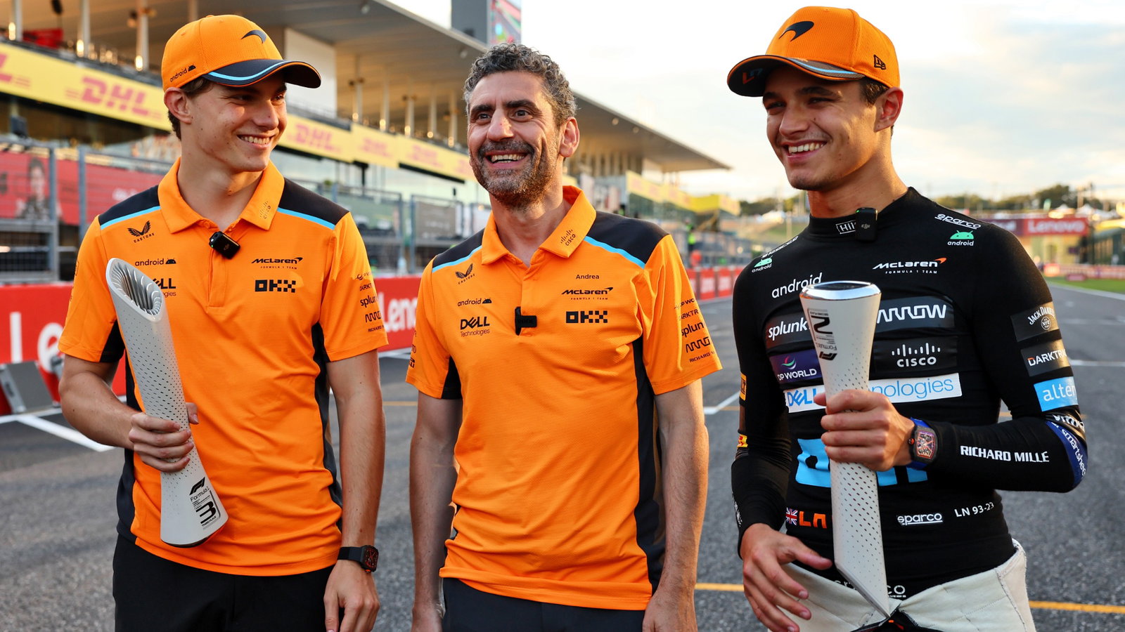(L to R): Oscar Piastri (AUS) McLaren celebrates his third position with Andrea Stella (ITA) McLaren Team Principal and