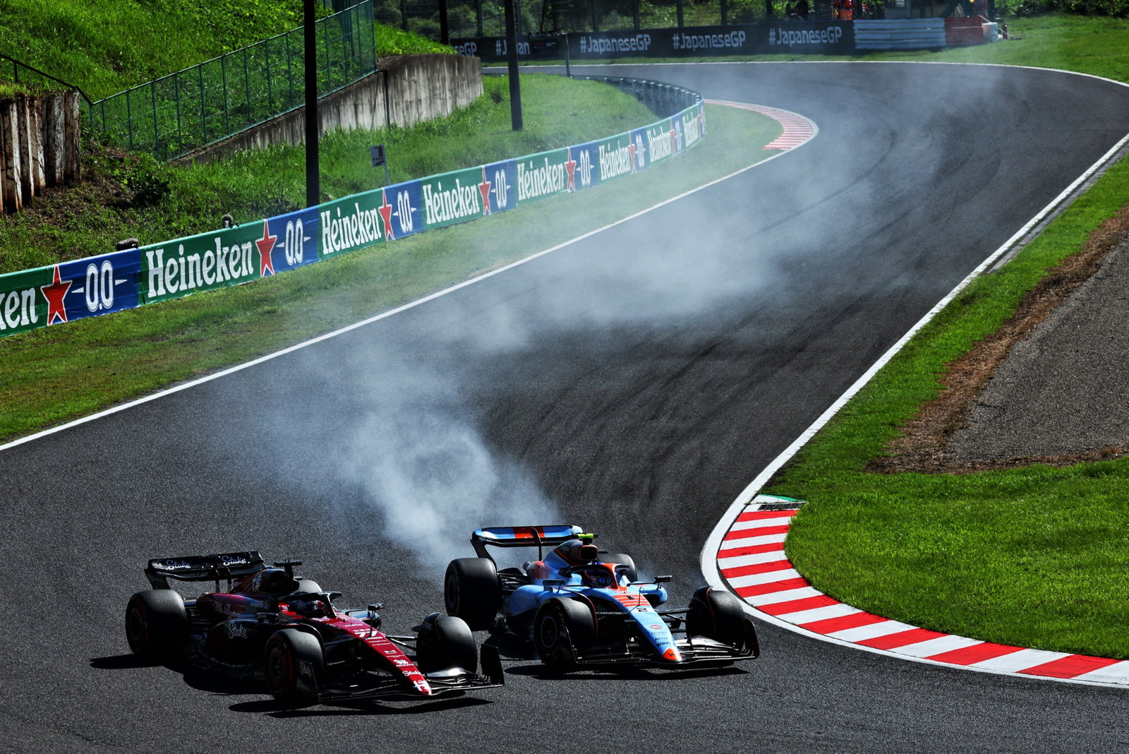 (L to R): Valtteri Bottas (FIN) Alfa Romeo F1 Team C43 and Logan Sargeant (USA) Williams Racing FW45 battle for position.