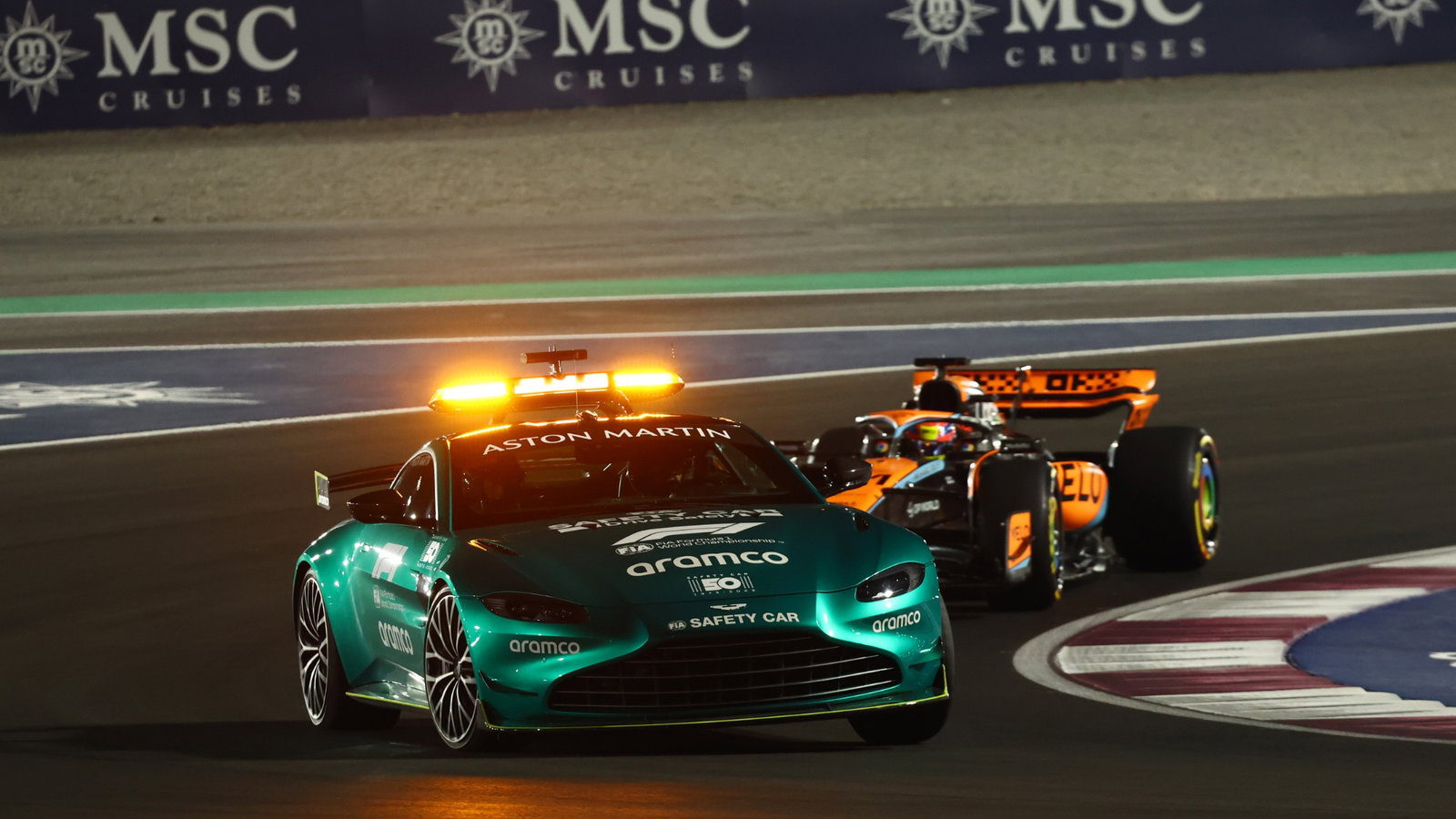  MCL60 leads behind the Aston Martin FIA Safety Car. Formula 1 World Championship, Rd 18, Qatar