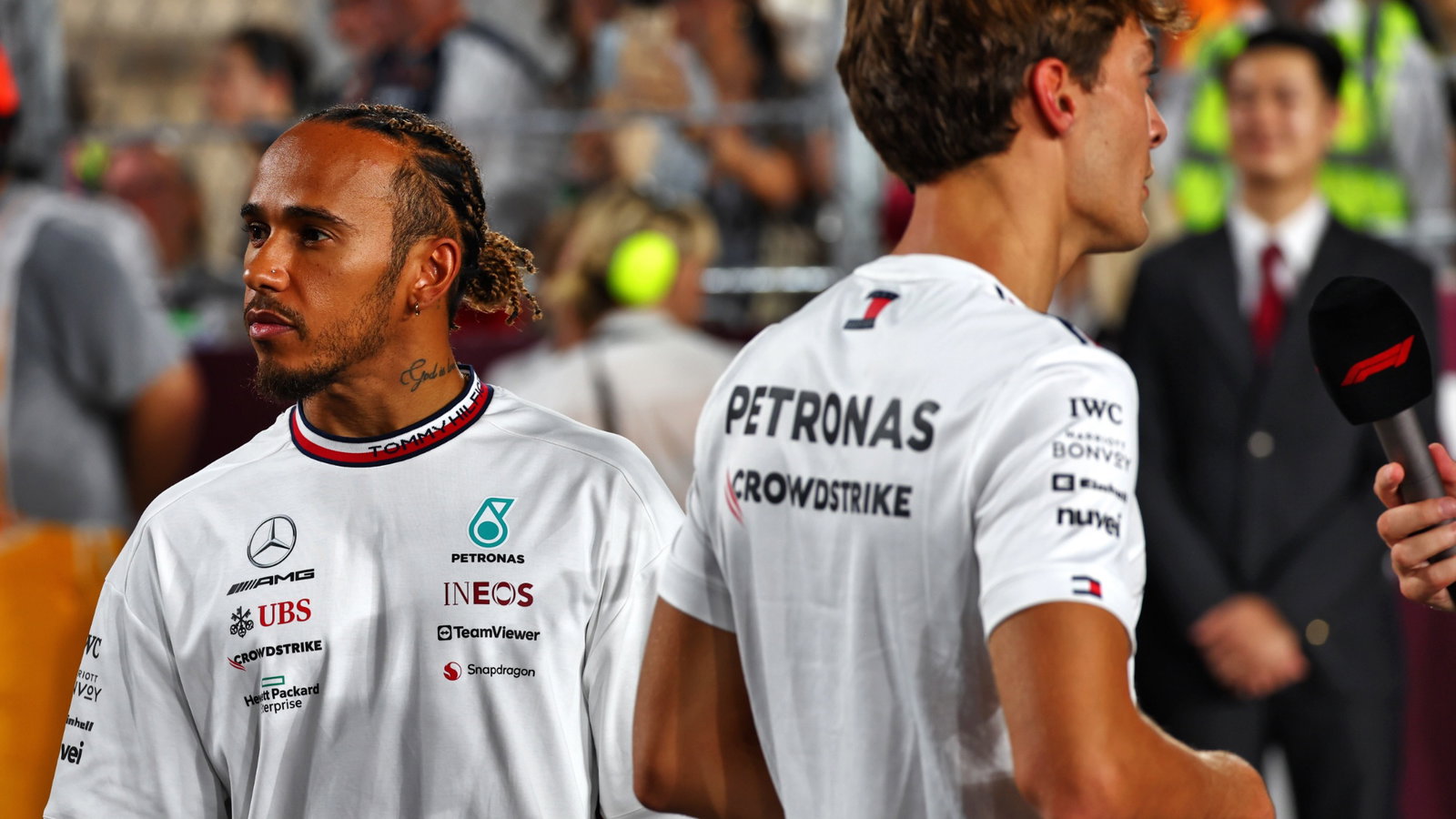 (L to R): Lewis Hamilton (GBR) Mercedes AMG F1 and George Russell (GBR) Mercedes AMG F1 on the drivers' parade. Formula 1