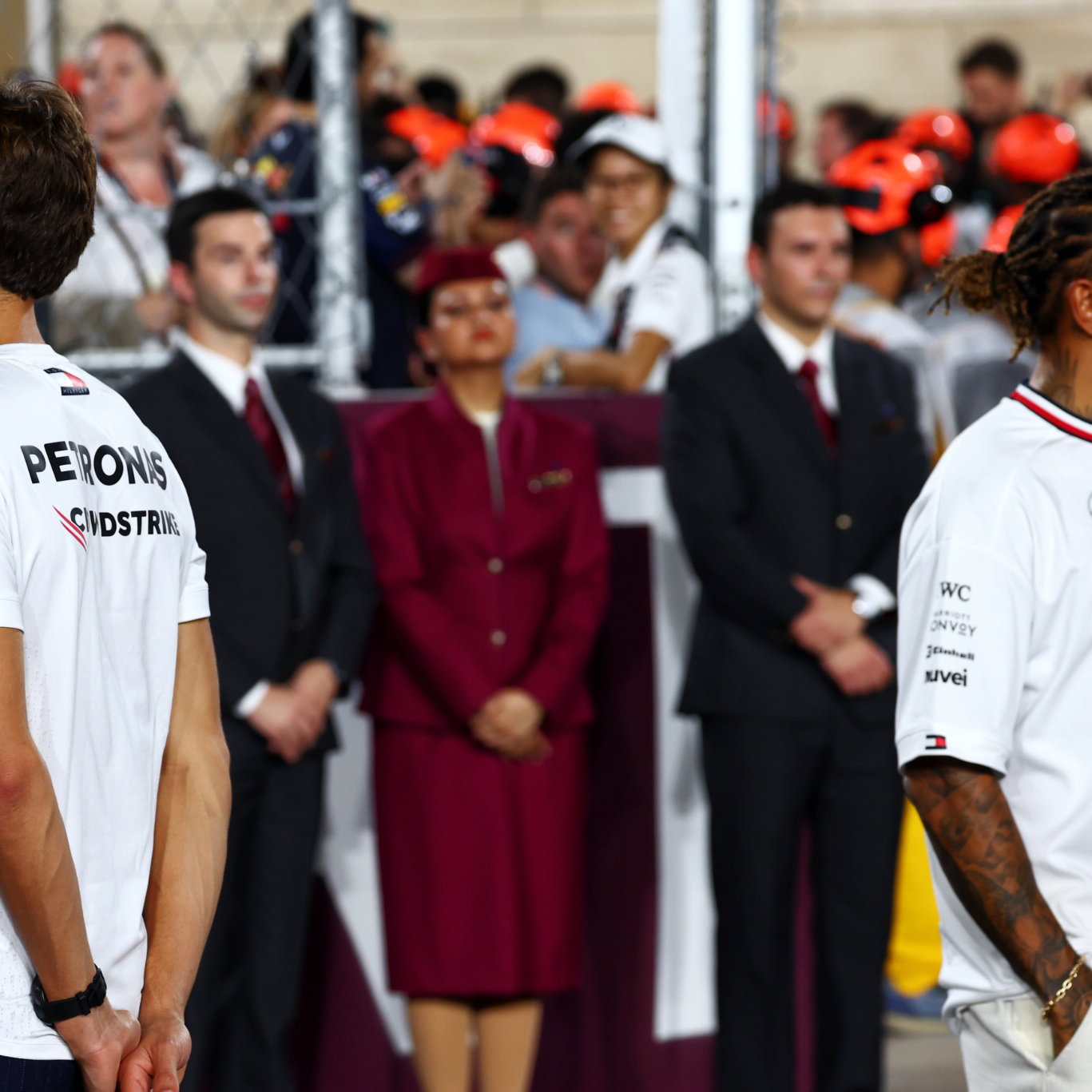 (L to R): George Russell (GBR) Mercedes AMG F1 and Lewis Hamilton (GBR) Mercedes AMG F1 on the drivers' parade. Formula 1