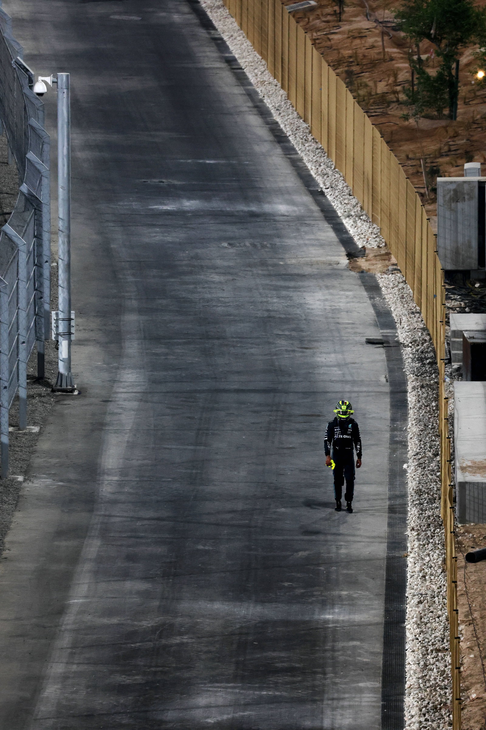 Lewis Hamilton (GBR) Mercedes AMG F1 walks back to the paddock after he crashed out at the start of the race. Formula 1