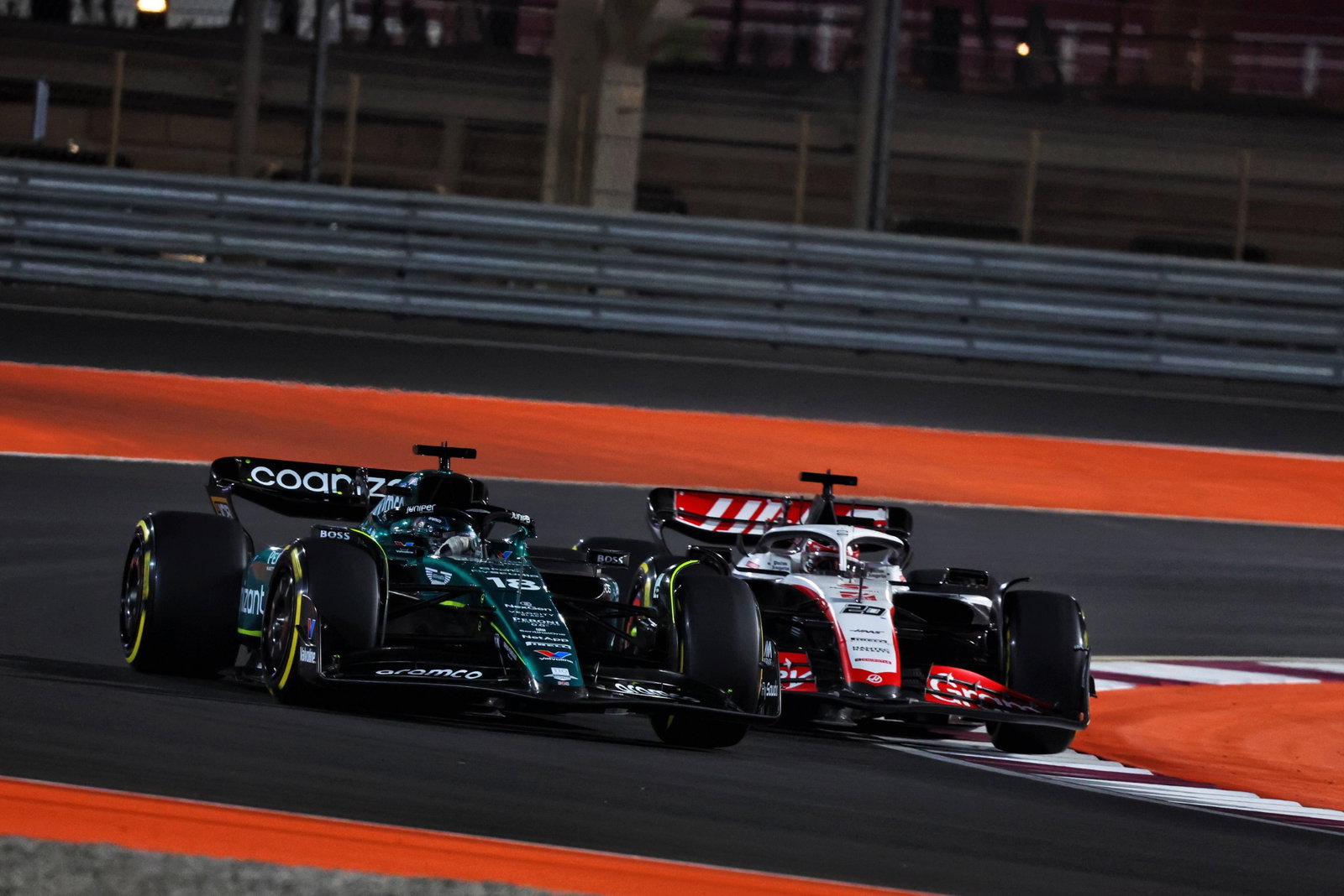 Lance Stroll (CDN) Aston Martin F1 Team AMR23 and Kevin Magnussen (DEN) Haas VF-23 battle for position. Formula 1 World