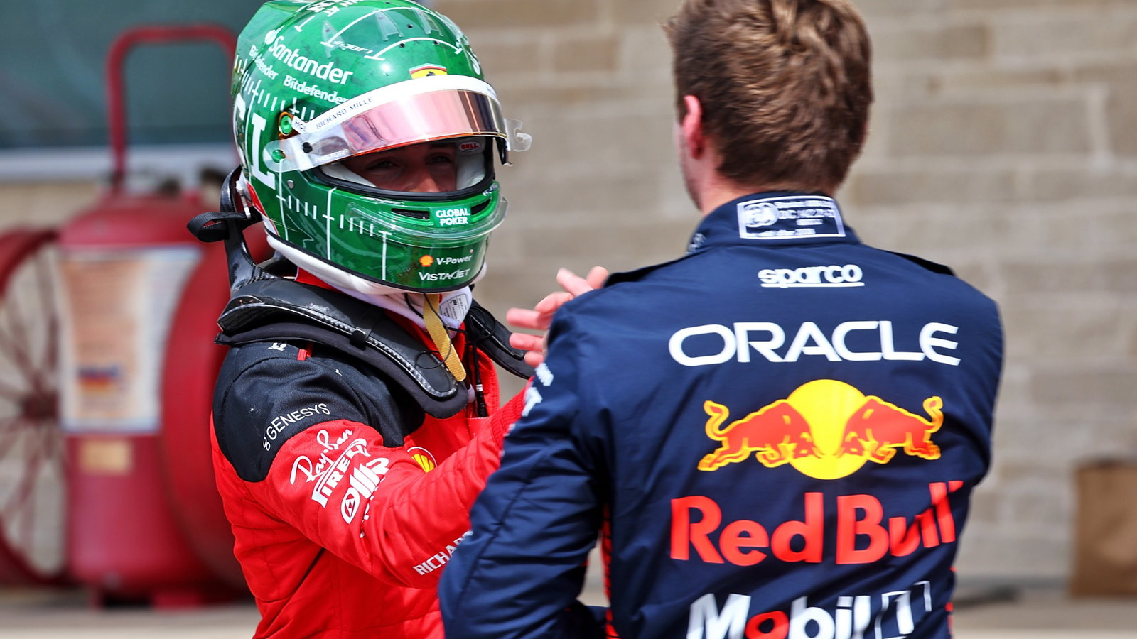 (L to R): Charles Leclerc (MON) Ferrari with