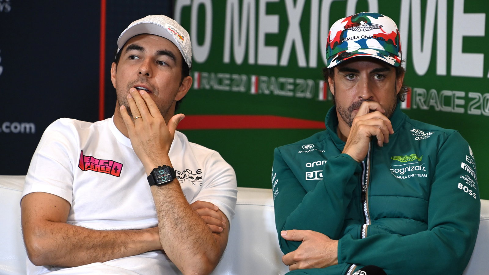 (L to R): Sergio Perez (MEX) Red Bull Racing and Fernando Alonso (ESP) Aston Martin F1 Team in the FIA Press Conference.
