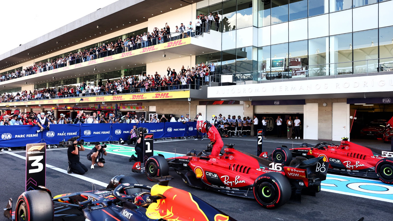 Qualifying top three in parc ferme: Carlos 