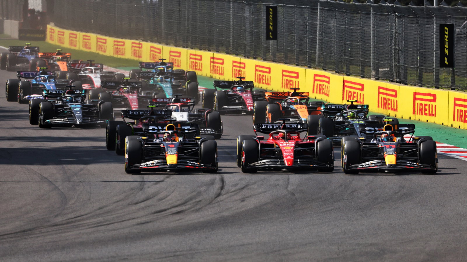 (L to R): Max Verstappen (NLD) Red Bull Racing RB19; Charles Leclerc (MON) Ferrari SF-23; and Sergio Perez (MEX) Red Bull