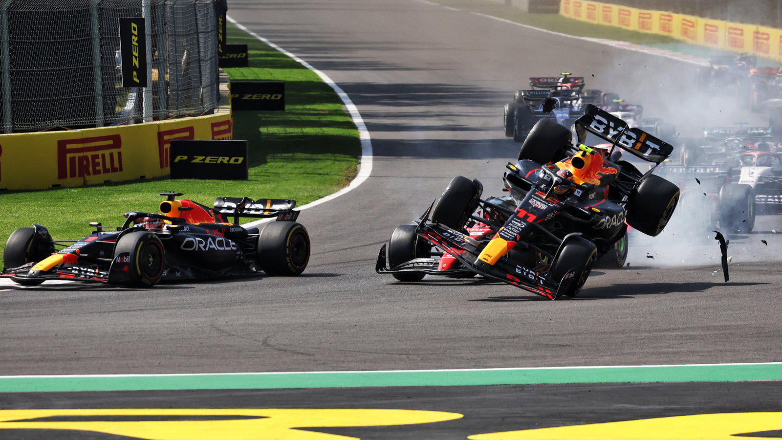 (L to R): Max Verstappen (NLD) Red Bull Racing RB19; Charles Leclerc (MON) Ferrari SF-23; and Sergio Perez (MEX) Red Bull