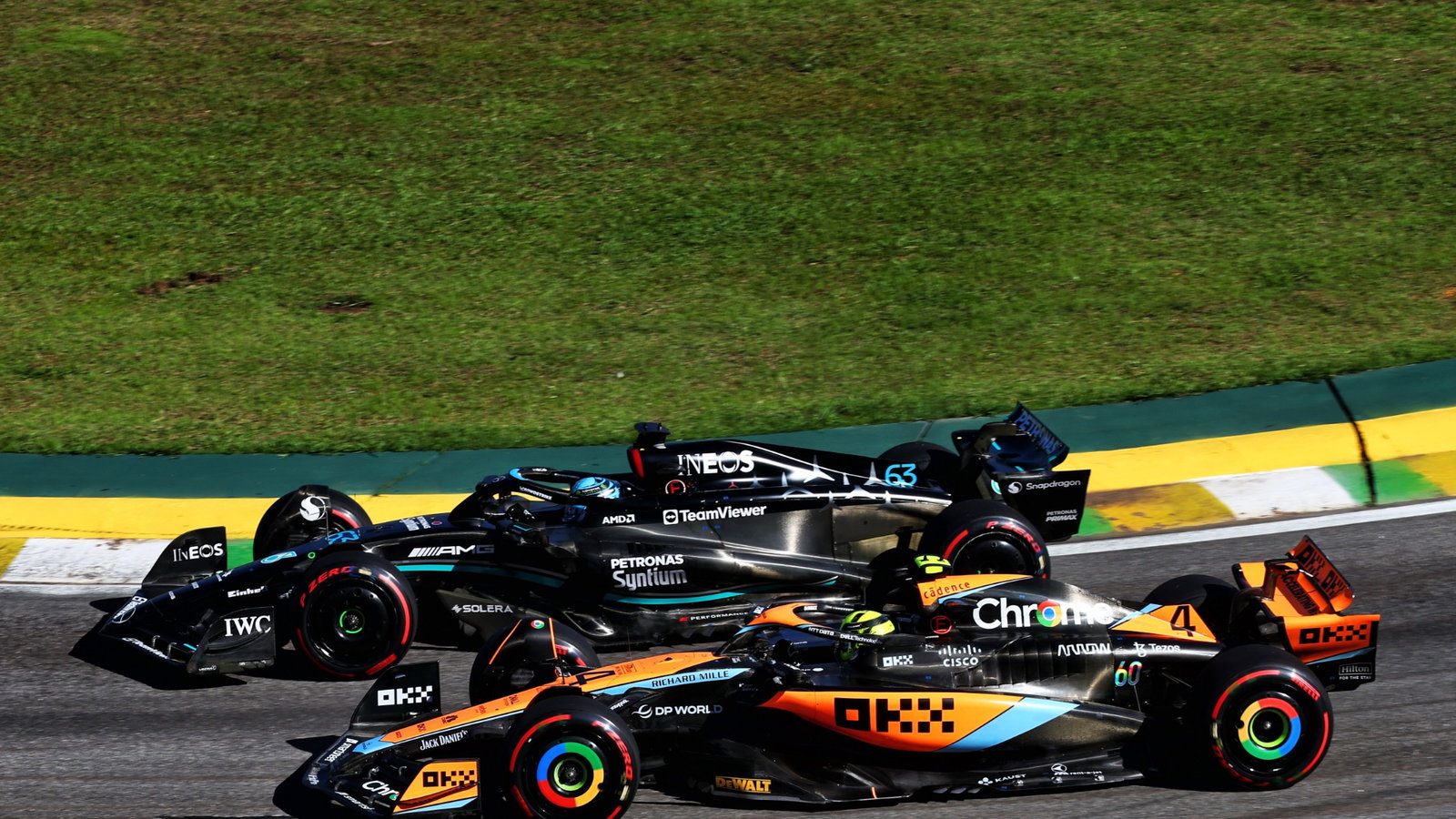 Lando Norris (GBR) McLaren MCL60 and George Russell (GBR) Mercedes AMG F1 W14 battle for position. Formula 1 World