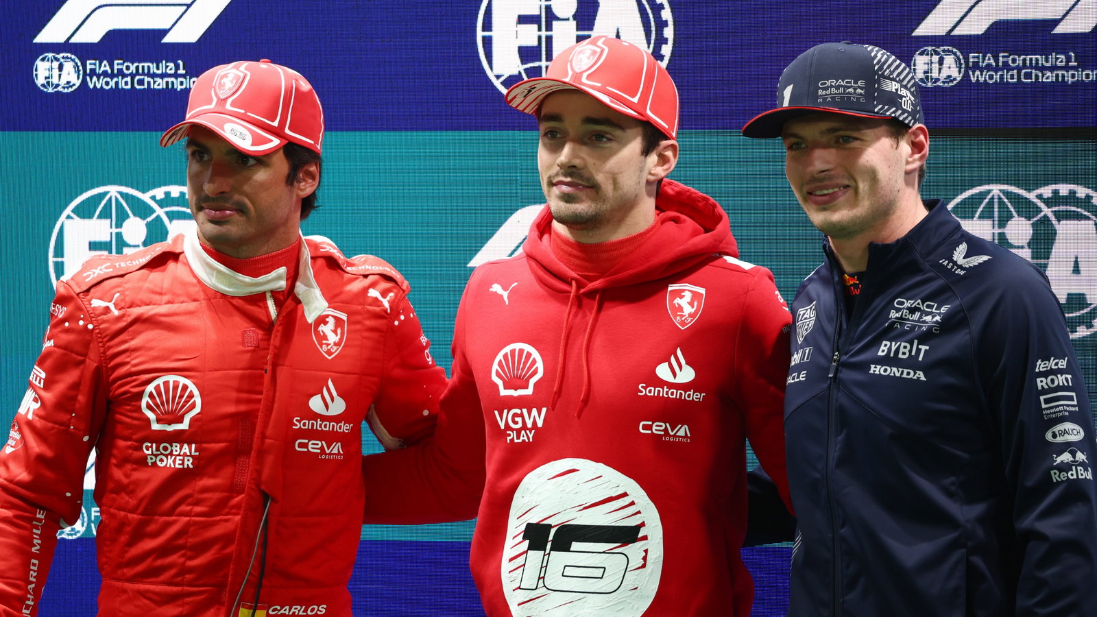 (L to R): Carlos Sainz Jr (ESP) Ferrari; Charles Leclerc (MON) Ferrari; and Max Verstappen (NLD) Red Bull Racing, in