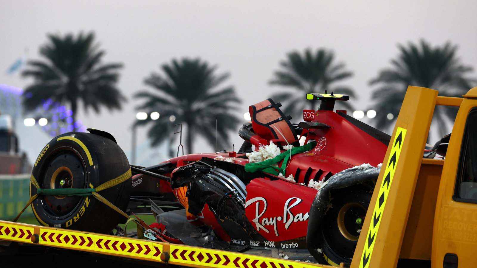 The Ferrari SF-23 of Carlos Sainz Jr (ESP) Ferrari is recovered back to the pits on the back of a truck after he crashed in