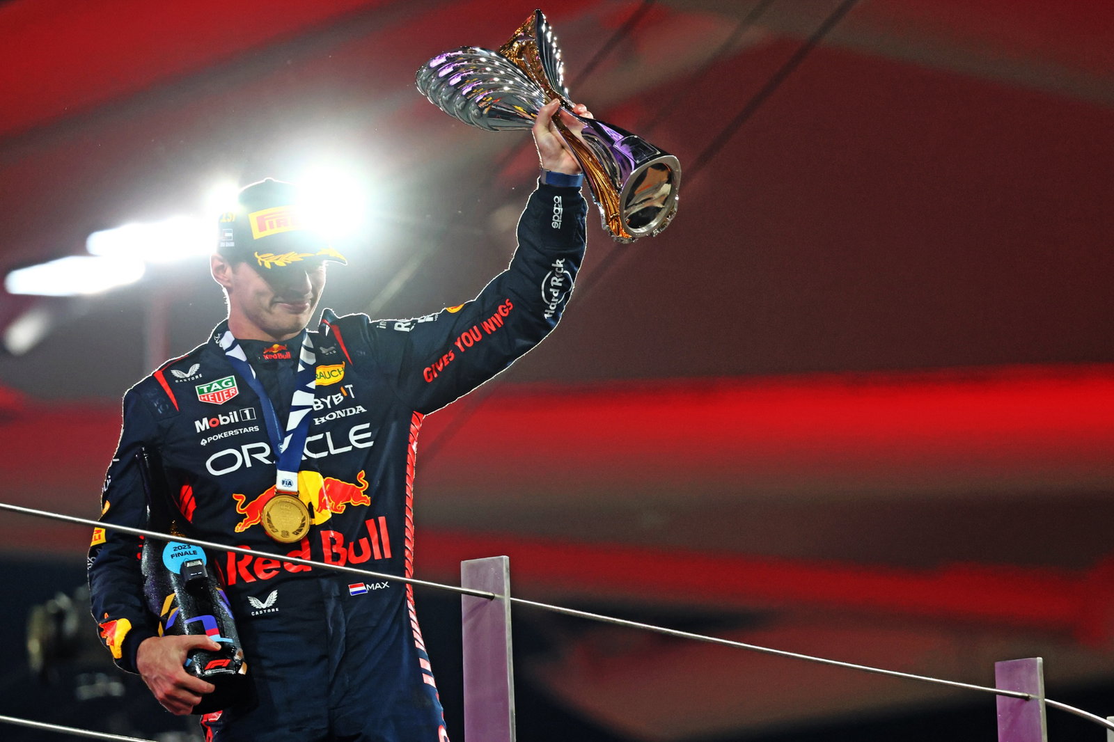 Race winner Max Verstappen (NLD) Red Bull Racing celebrates on the podium. Formula 1 World Championship, Rd 23, Abu Dhabi