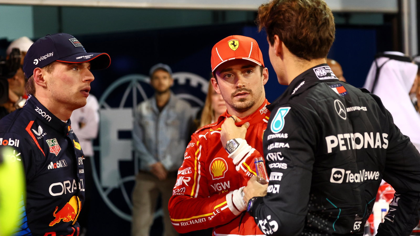(L to R): pole sitter Max Verstappen (NLD) Red Bull Racing with Charles Leclerc (MON) Ferrari and George Russell (GBR)
