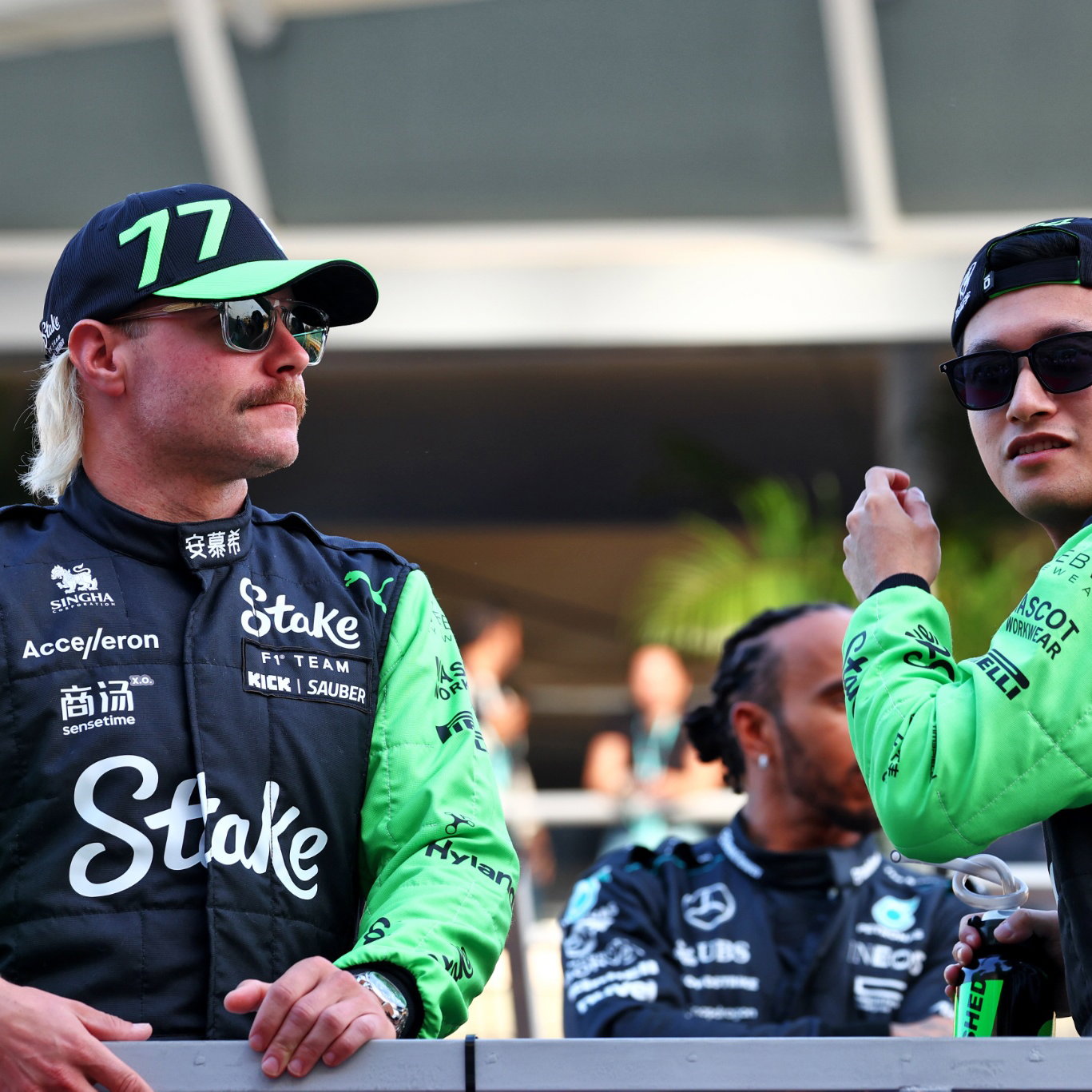 (L to R): Valtteri Bottas (FIN) Sauber with team mate Zhou Guanyu (CHN) Sauber on the drivers' parade. Formula 1 World