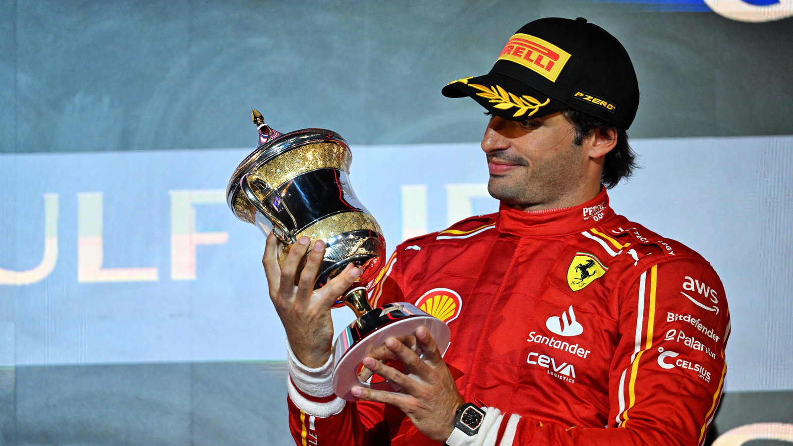 Carlos Sainz Jr (ESP) Ferrari celebrates his third position on the podium. Formula 1 World Championship, Rd 1, Bahrain