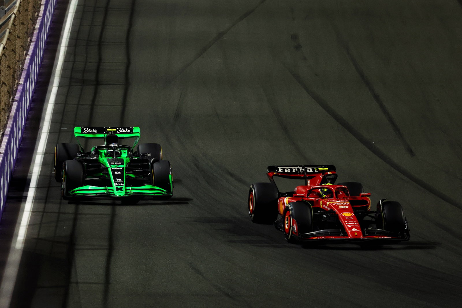(L to R): Zhou Guanyu (CHN) Sauber C44 and Oliver Bearman (GBR) Ferrari SF-24 Reserve Driver battle for position. Formula