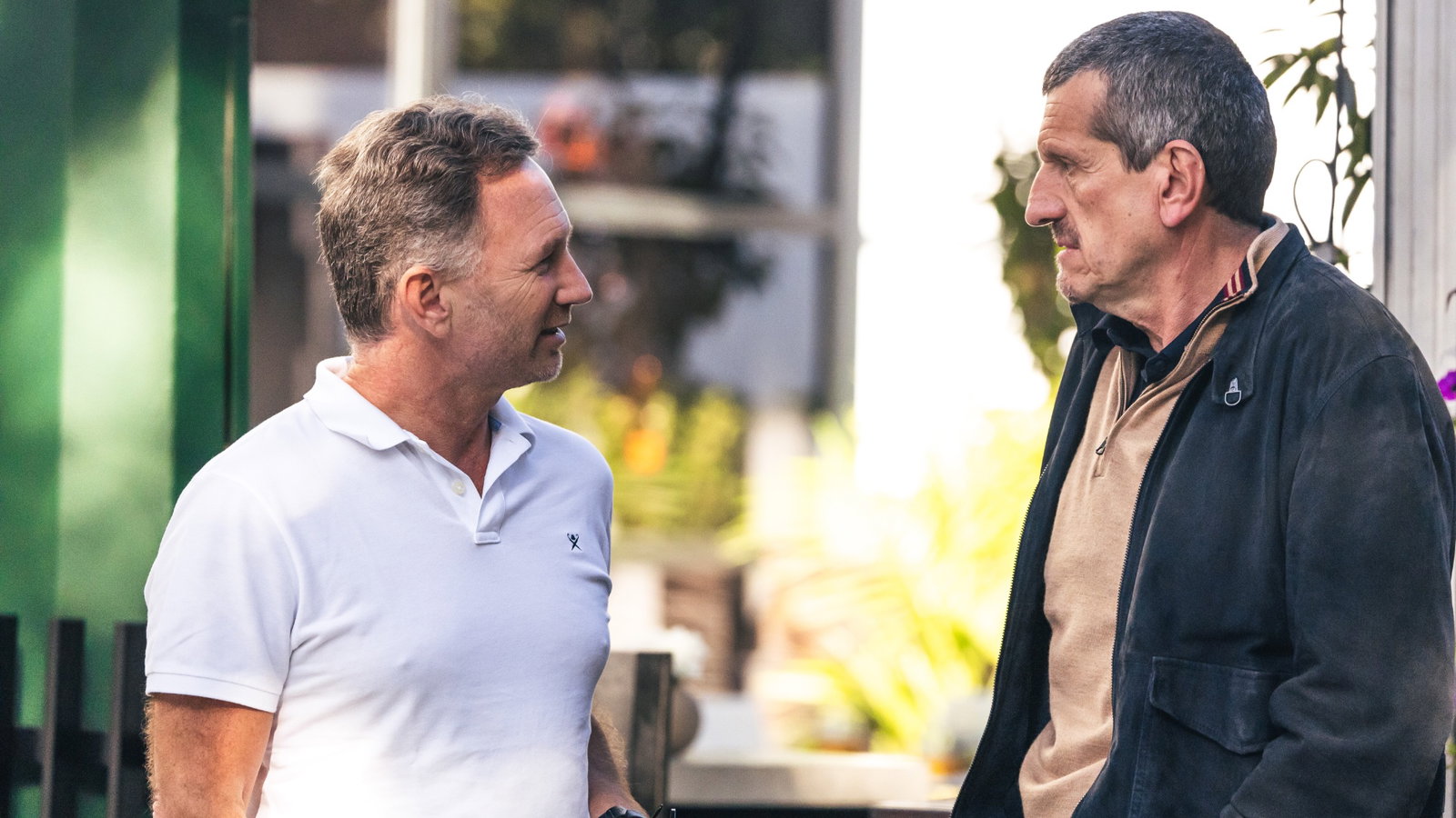 (L to R): Christian Horner (GBR) Red Bull Racing Team Principal with Guenther Steiner (ITA) RTL F1 TV Presenter. Formula 1