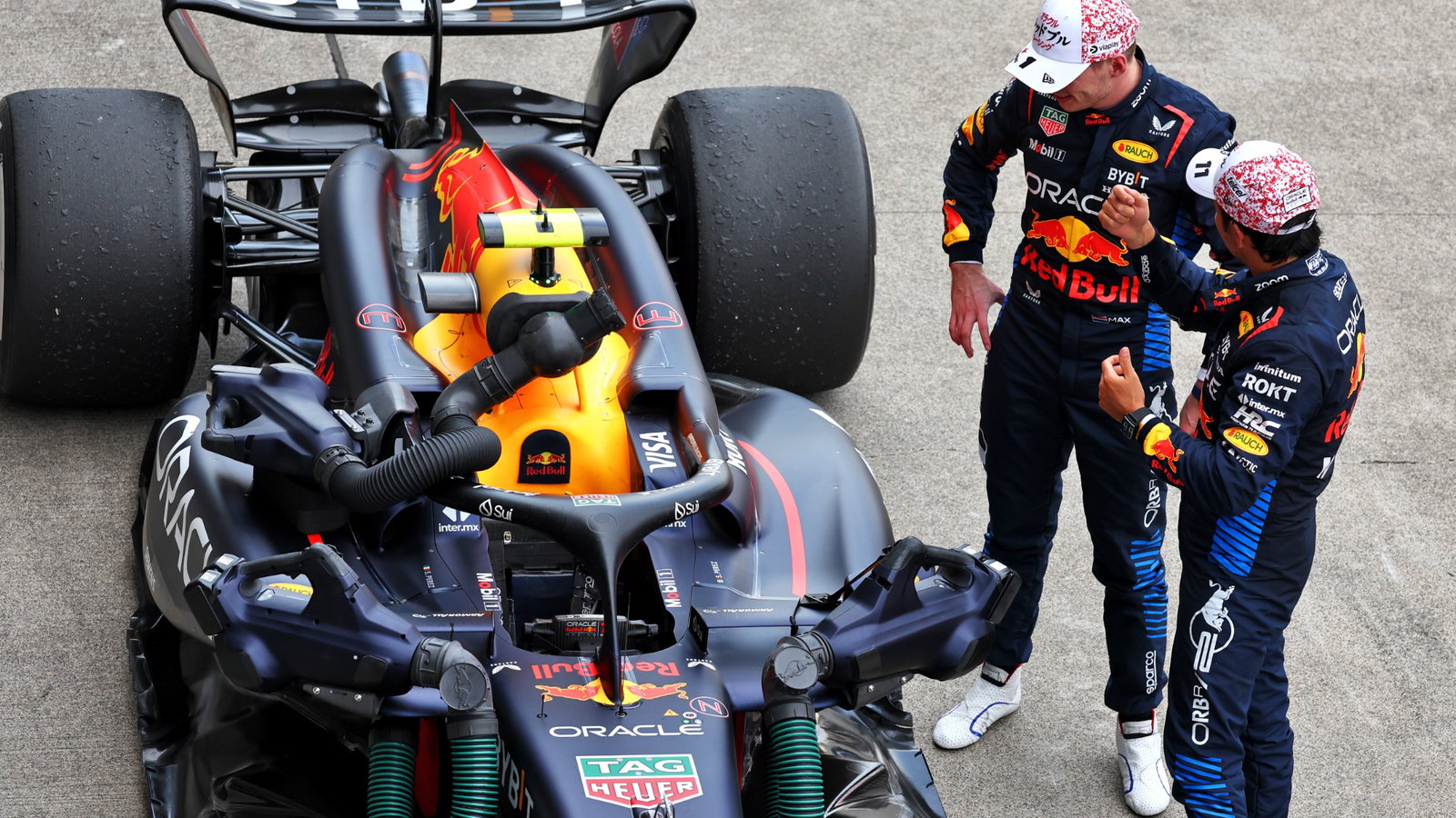 Race winner Max Verstappen (NLD) Red Bull Racing RB20 with second placed team mate Sergio Perez (MEX) Red Bull Racing in
