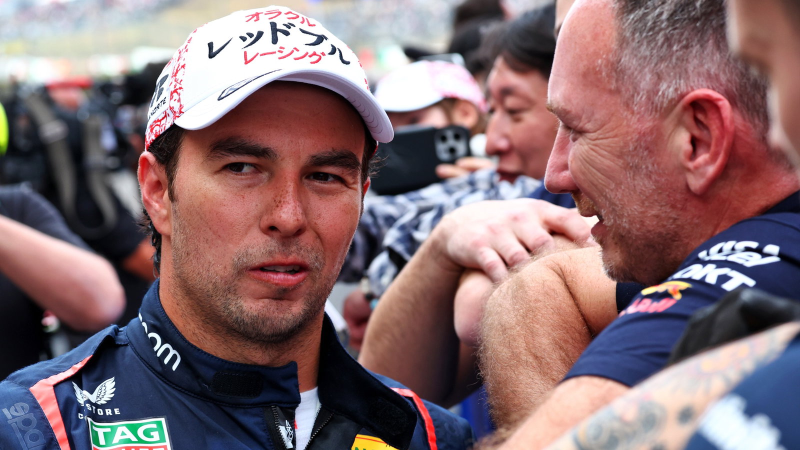 Second placed Sergio Perez (MEX) Red Bull Racing with Christian Horner (GBR) Red Bull Racing Team Principal in parc ferme.