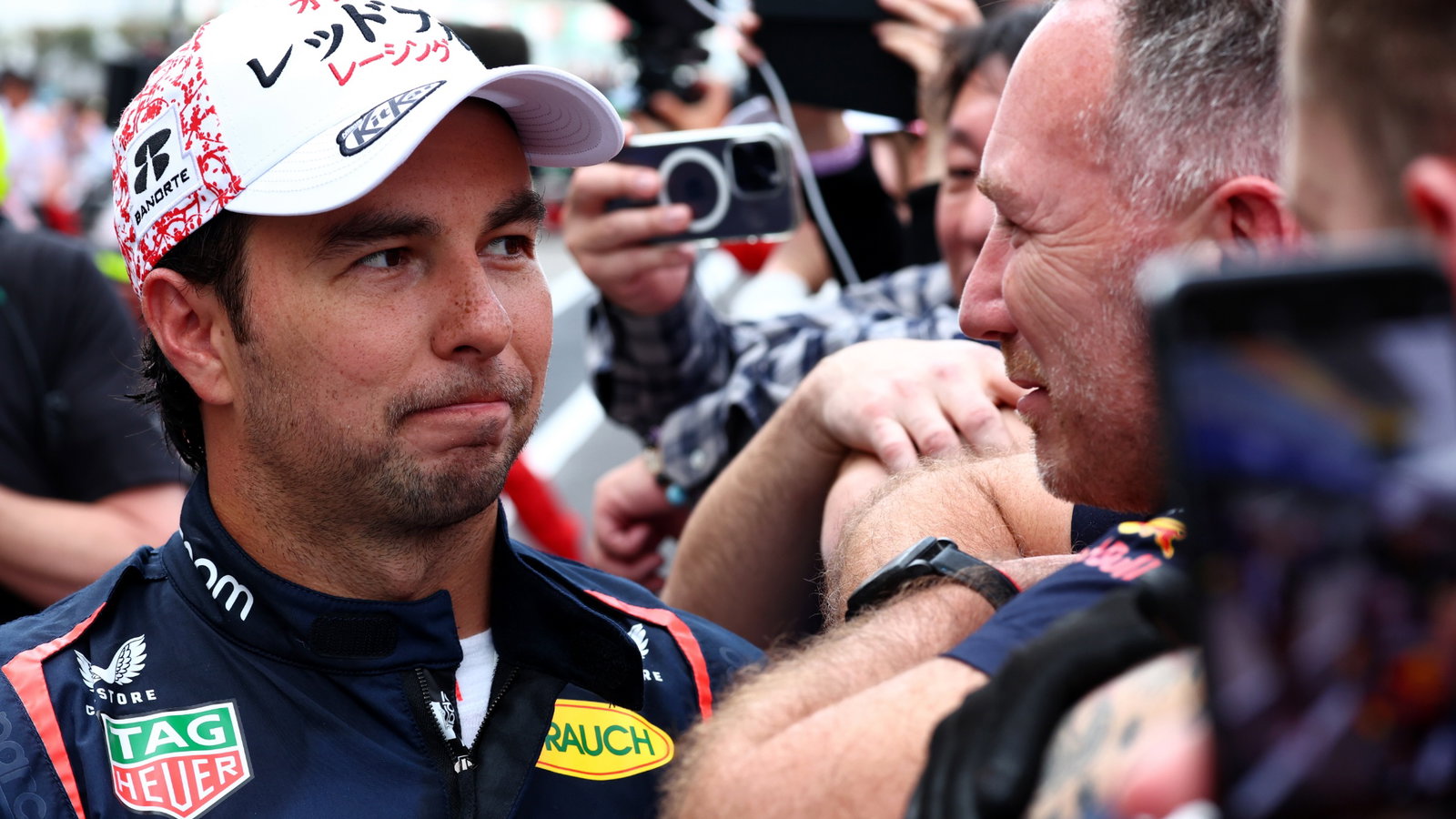 Second placed Sergio Perez (MEX) Red Bull Racing with Christian Horner (GBR) Red Bull Racing Team Principal in parc ferme.