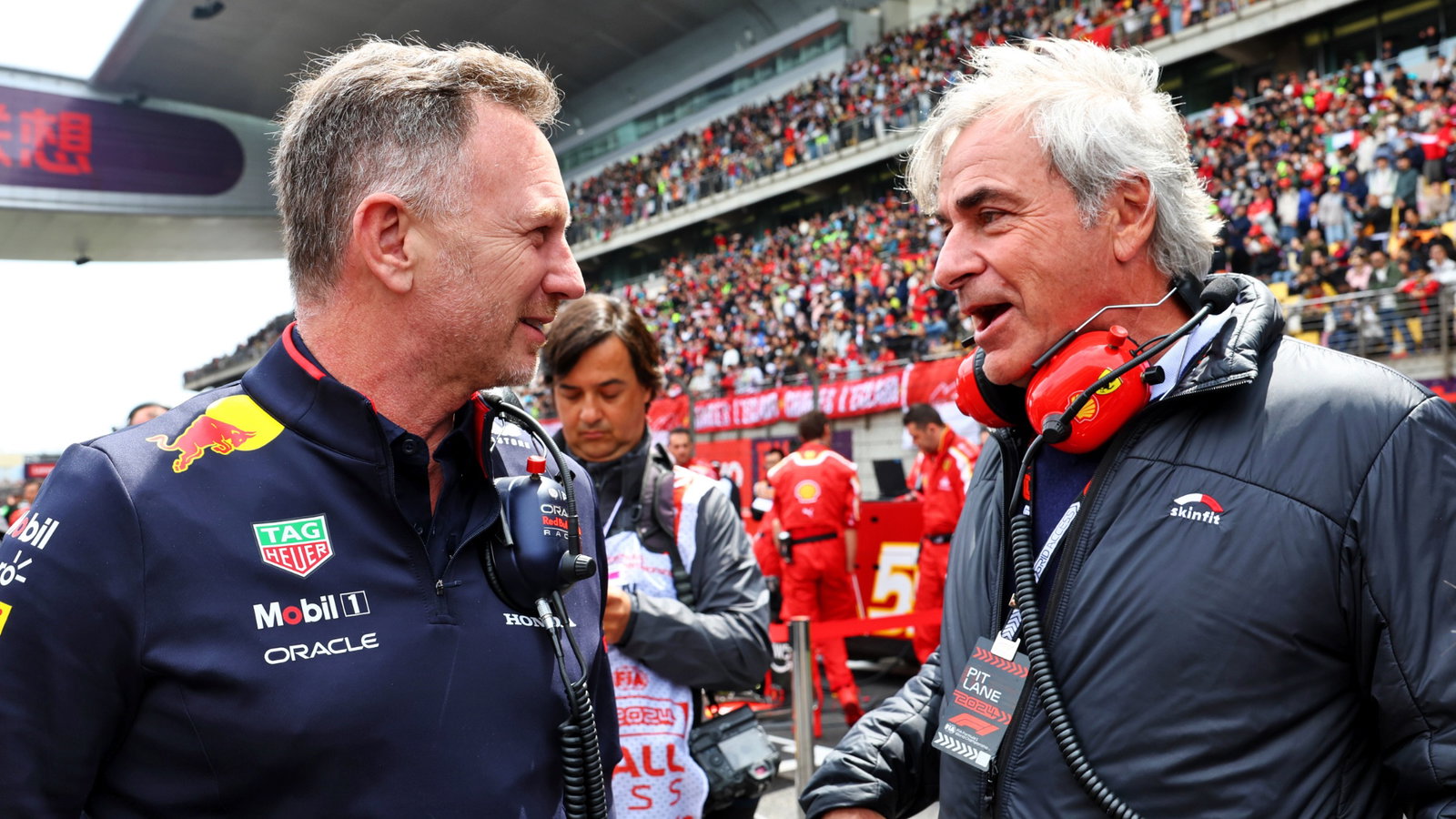 (L to R): Christian Horner (GBR) Red Bull Racing Team Principal with Carlos Sainz (ESP) on the grid. Formula 1 World
