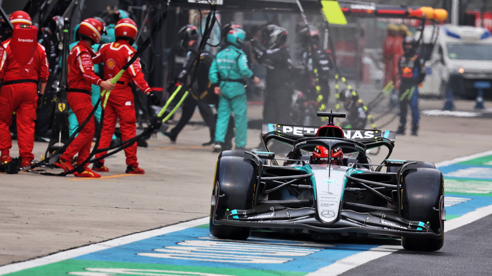 George Russell (GBR) Mercedes AMG F1 W15 makes a pit stop. Formula 1 World Championship, Rd 5, Chinese Grand Prix,