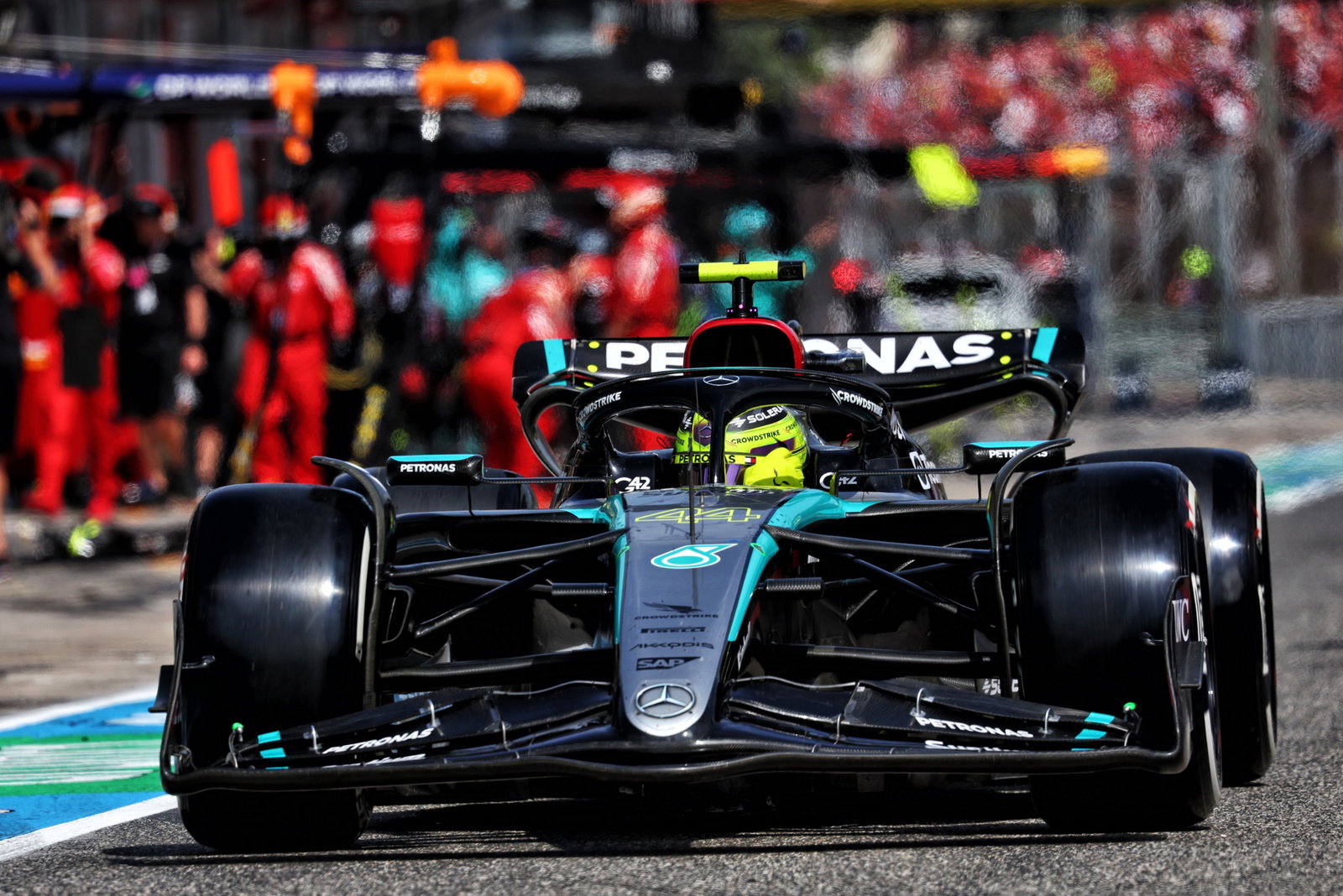 Lewis Hamilton (GBR) Mercedes AMG F1 W15 makes a pit stop. Formula 1 World Championship, Rd 7, Emilia Romagna Grand Prix,