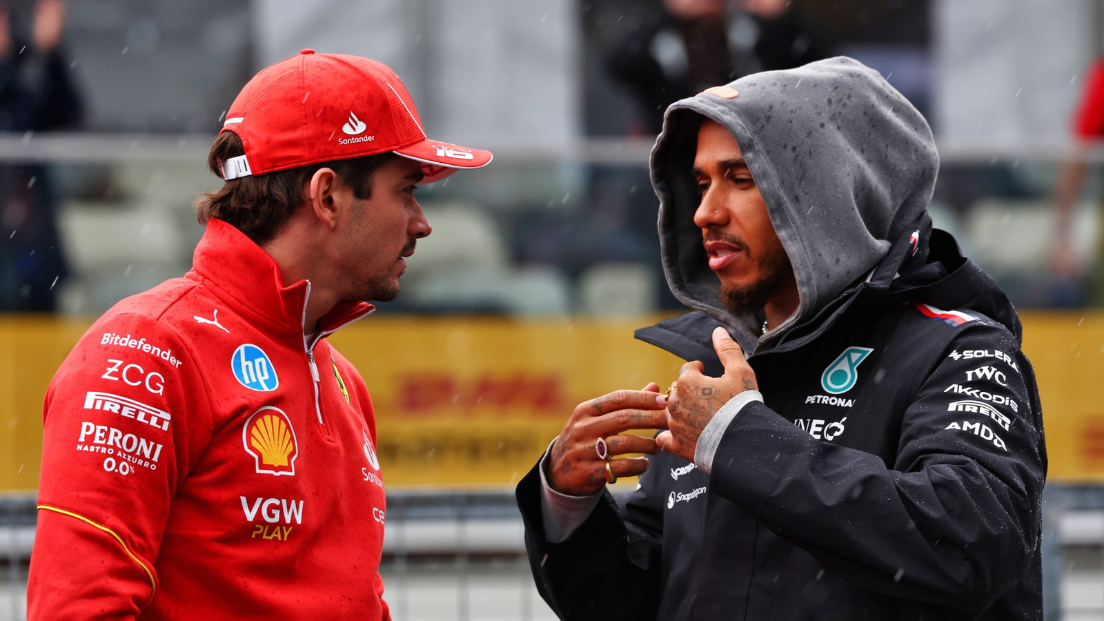 (L to R): Charles Leclerc (MON) Ferrari with Lewis Hamilton (GBR) Mercedes AMG F1 on the drivers' parade. Formula 1 World