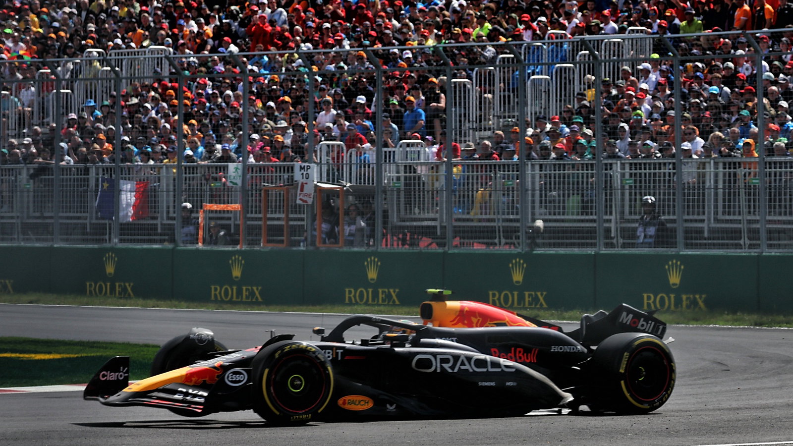 Sergio Perez (MEX) Red Bull Racing RB20 with a broken rear wing. Formula 1 World Championship, Rd 9, Canadian Grand Prix,