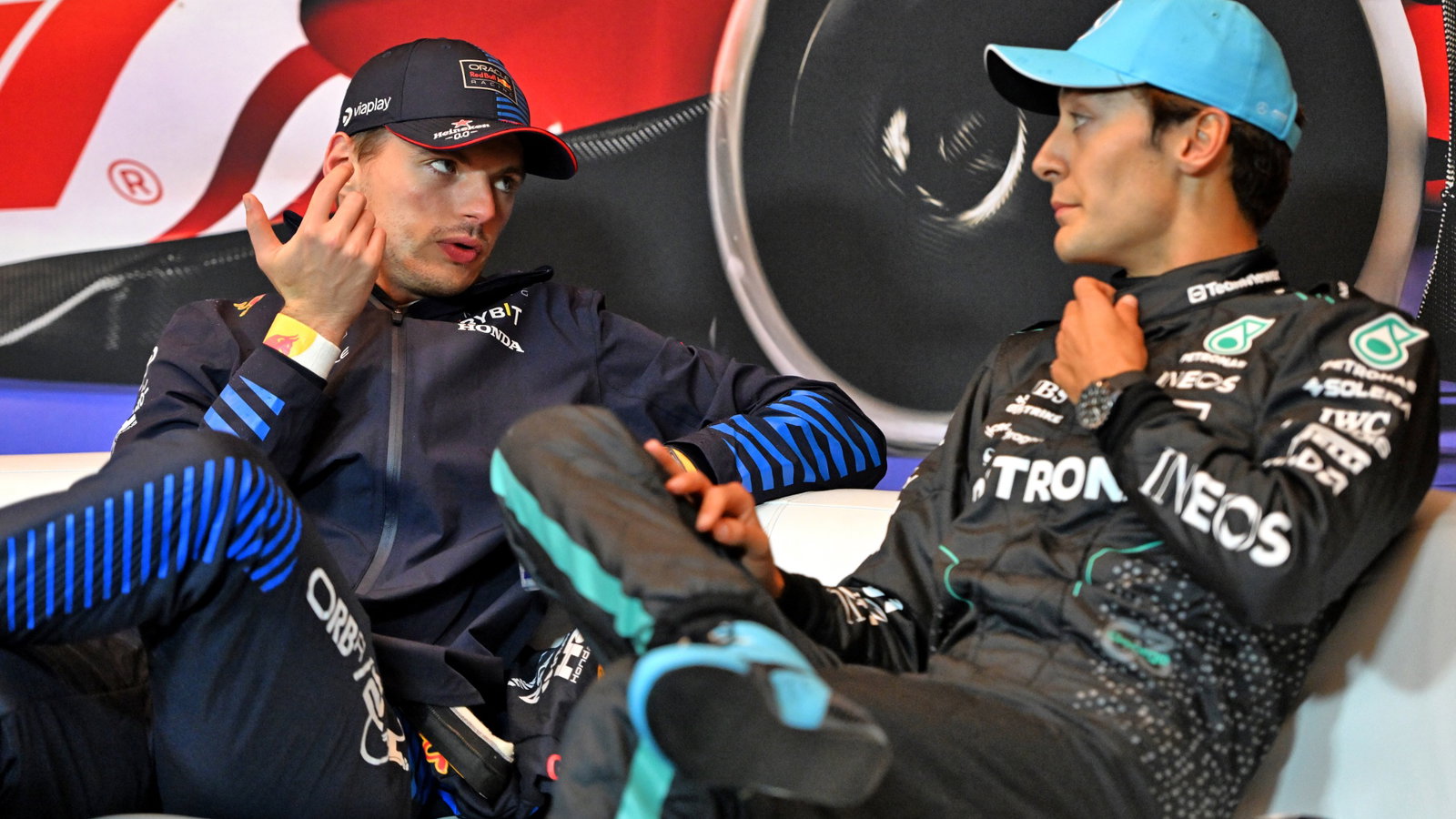 (L to R): Max Verstappen (NLD) Red Bull Racing and George Russell (GBR) Mercedes AMG F1 in the post race FIA Press