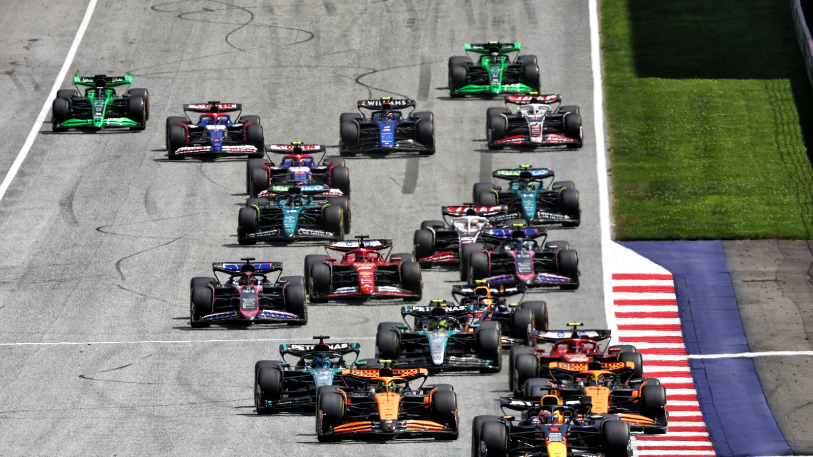 Max Verstappen (NLD) Red Bull Racing RB20 leads at the start of Sprint. Formula 1 World Championship, Rd 11, Austrian