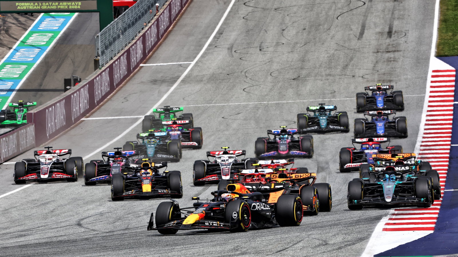 Max Verstappen (NLD) Red Bull Racing RB20 leads at the start of the race. Formula 1 World Championship, Rd 11, Austrian