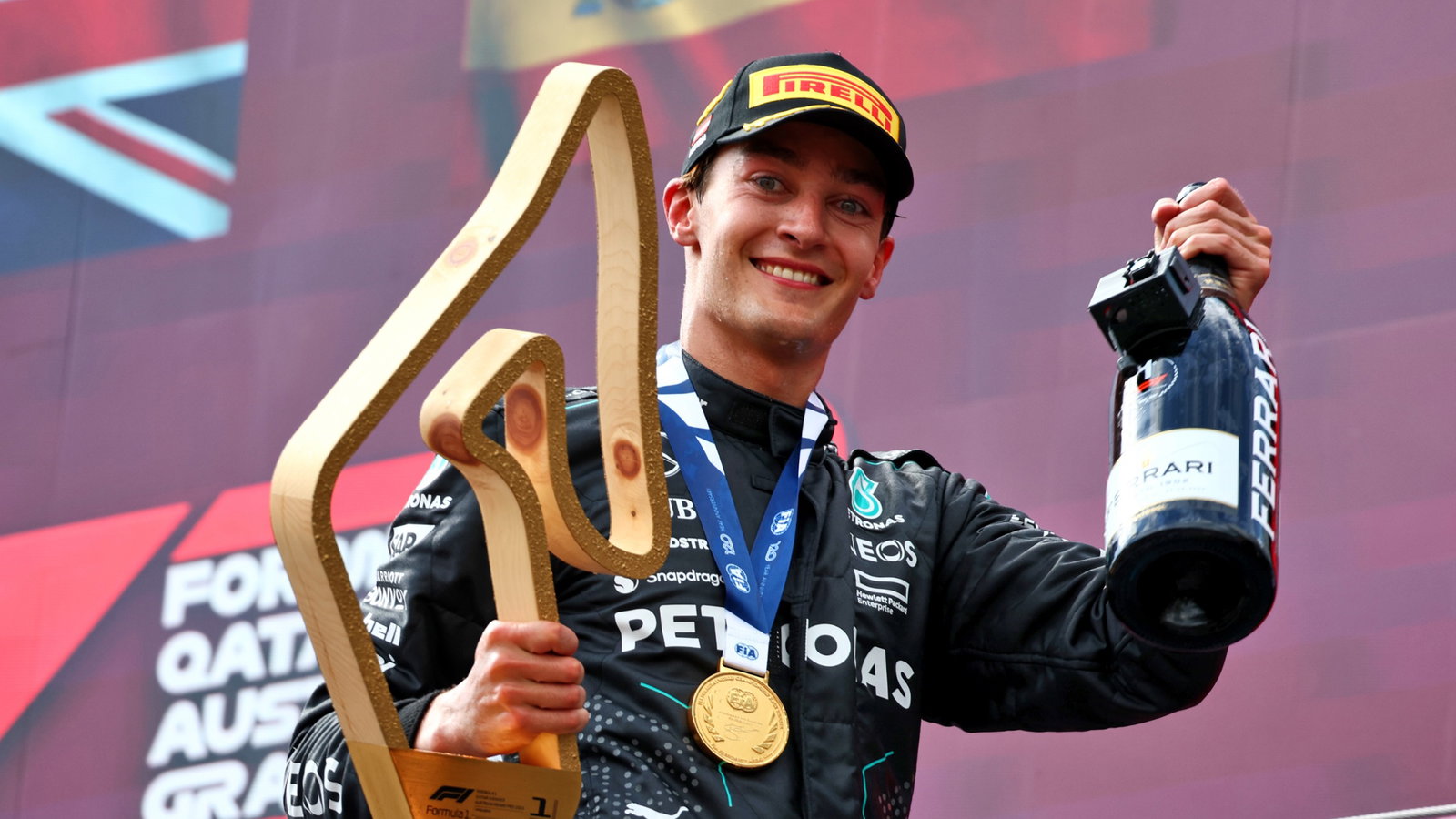 Race winner George Russell (GBR) Mercedes AMG F1 celebrates on the podium. Formula 1 World Championship, Rd 11, Austrian