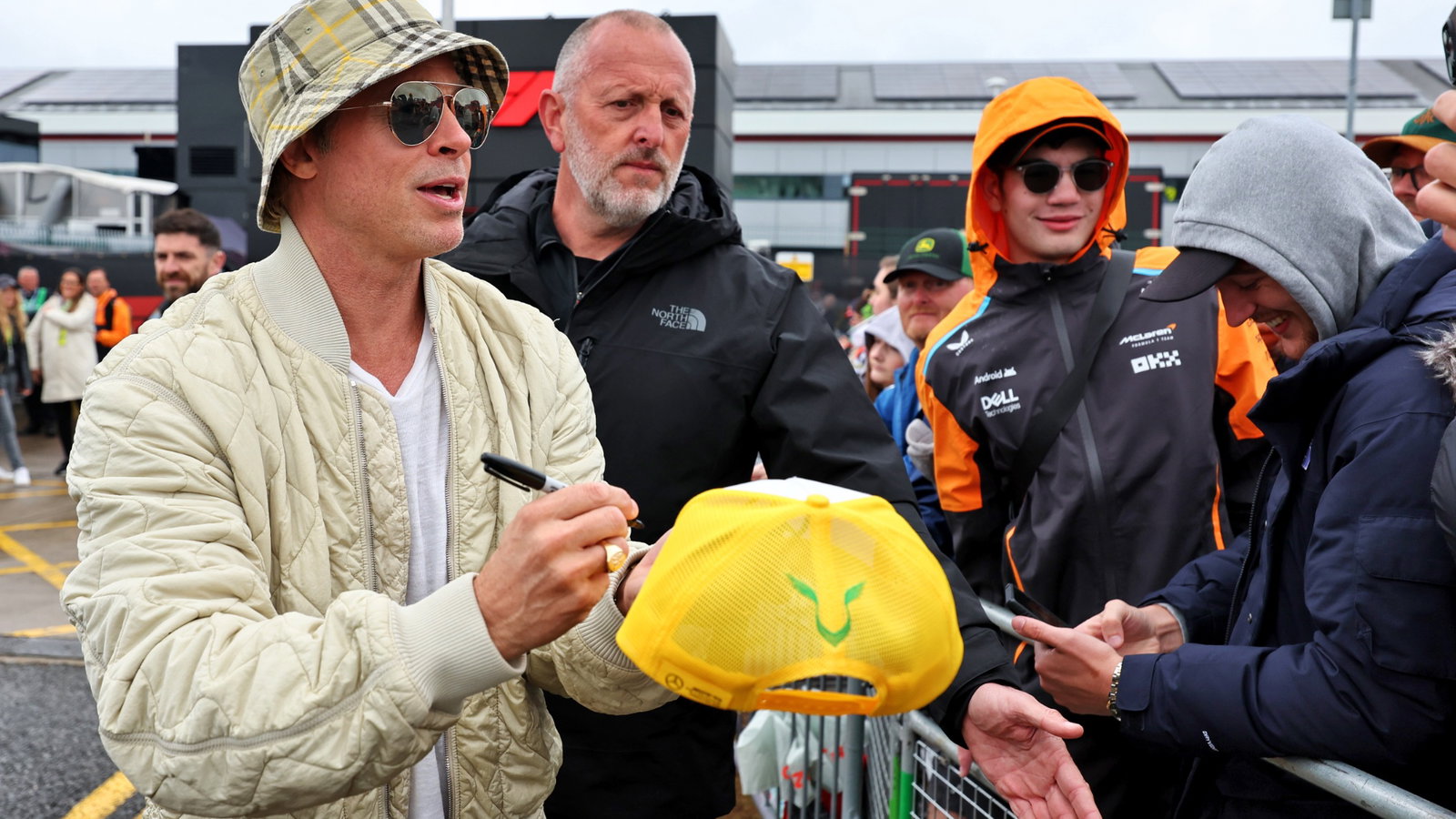 Brad Pitt (USA) Actor with fans. Formula 1 World Championship, Rd 12, British Grand Prix, Silverstone, England, Qualifying