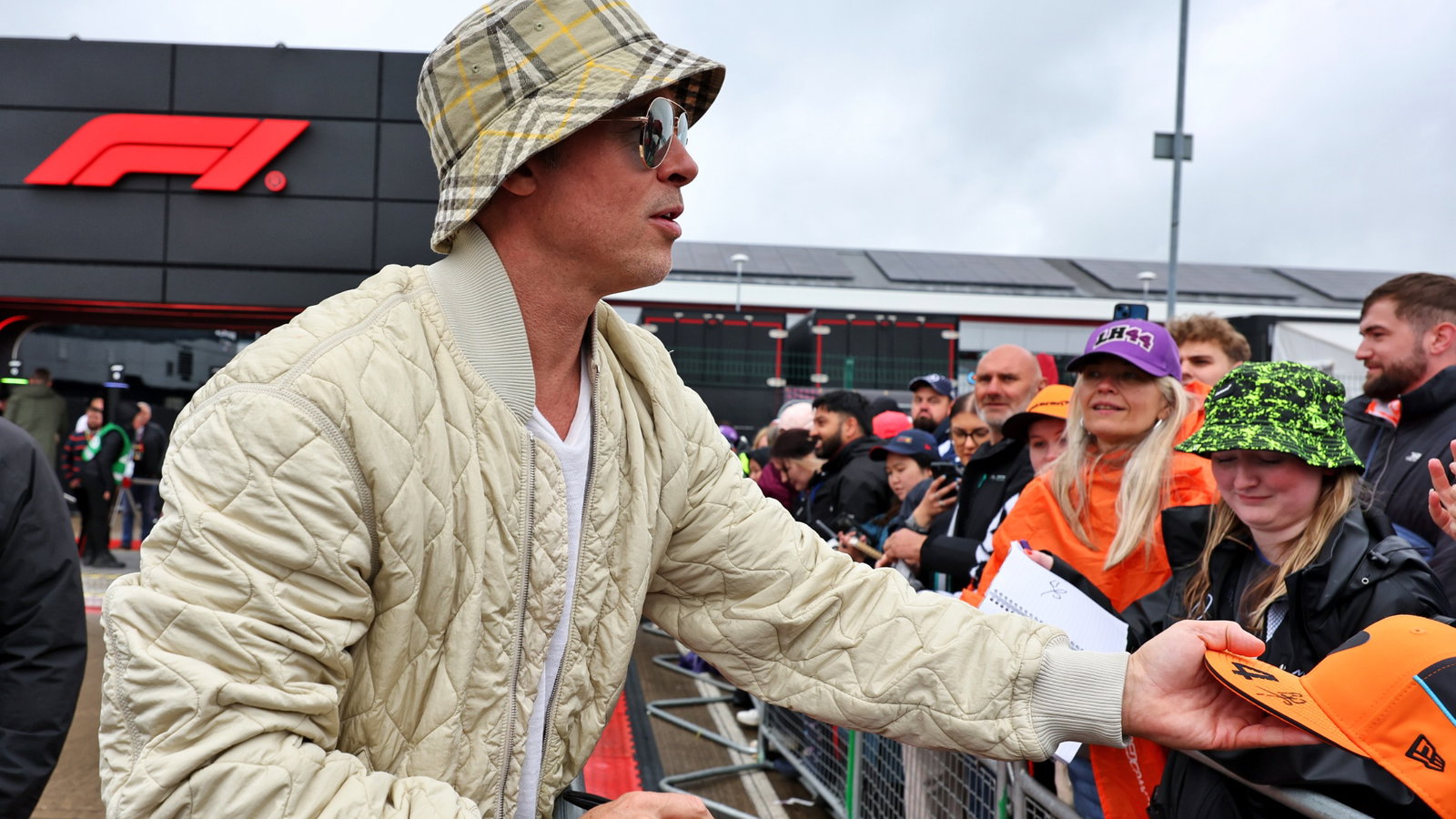 Brad Pitt (USA) Actor with fans. Formula 1 World Championship, Rd 12, British Grand Prix, Silverstone, England, Qualifying