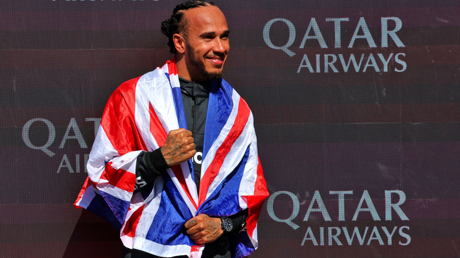 Race winner Lewis Hamilton (GBR) Mercedes AMG F1 celebrates on the podium. Formula 1 World Championship, Rd 12, British
