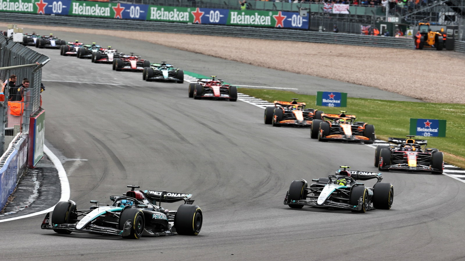George Russell (GBR) Mercedes AMG F1 W15 leads at the start of the race. Formula 1 World Championship, Rd 12, British