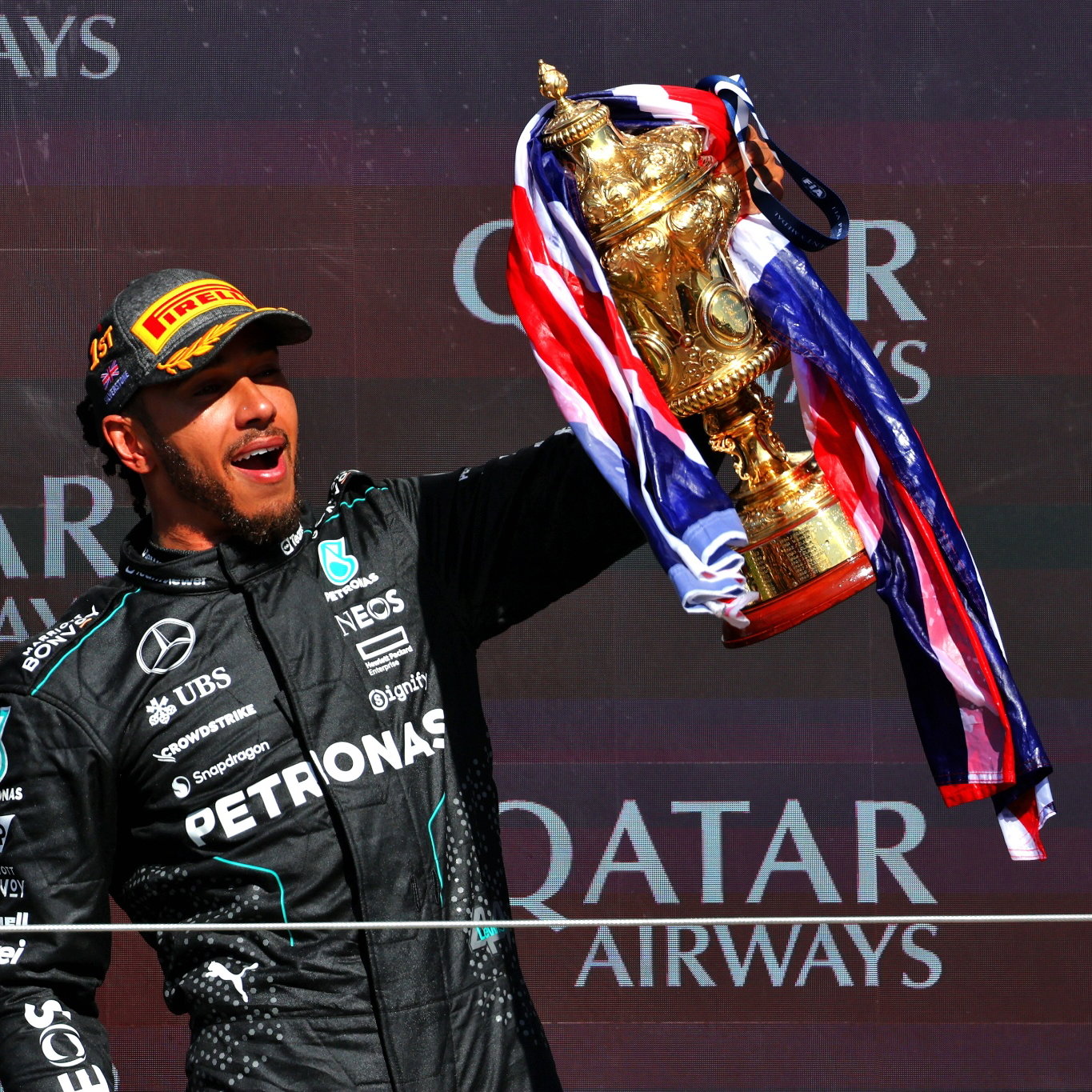 Race winner Lewis Hamilton (GBR) Mercedes AMG F1 celebrates on the podium. Formula 1 World Championship, Rd 12, British