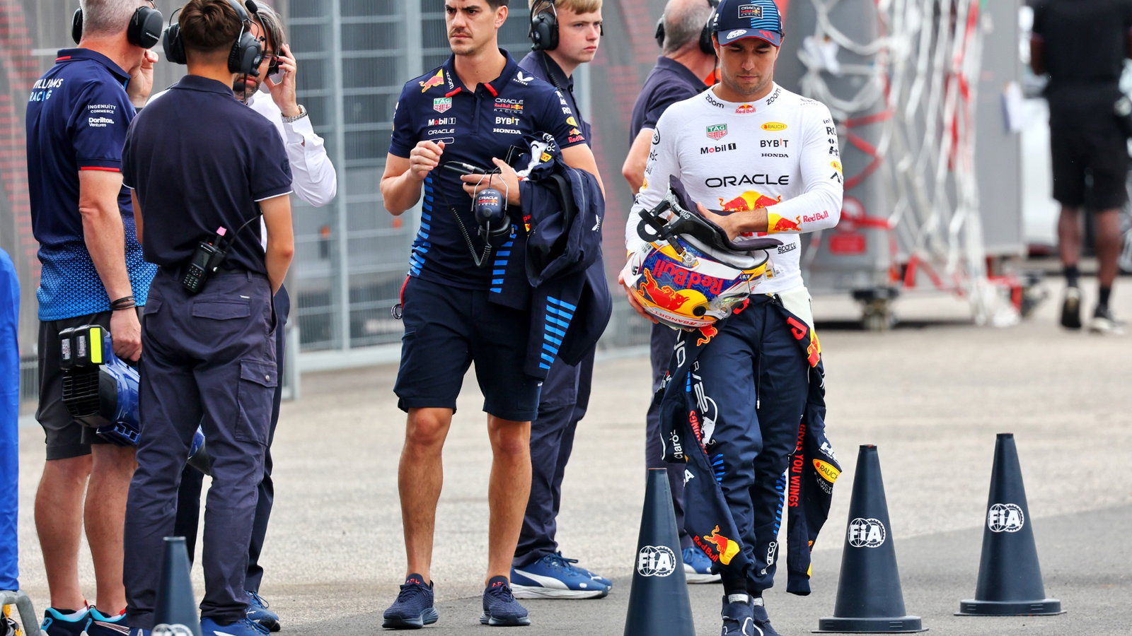 Sergio Perez (MEX) Red Bull Racing returns to the pits after crashing out in qualifying. Formula 1 World Championship, Rd