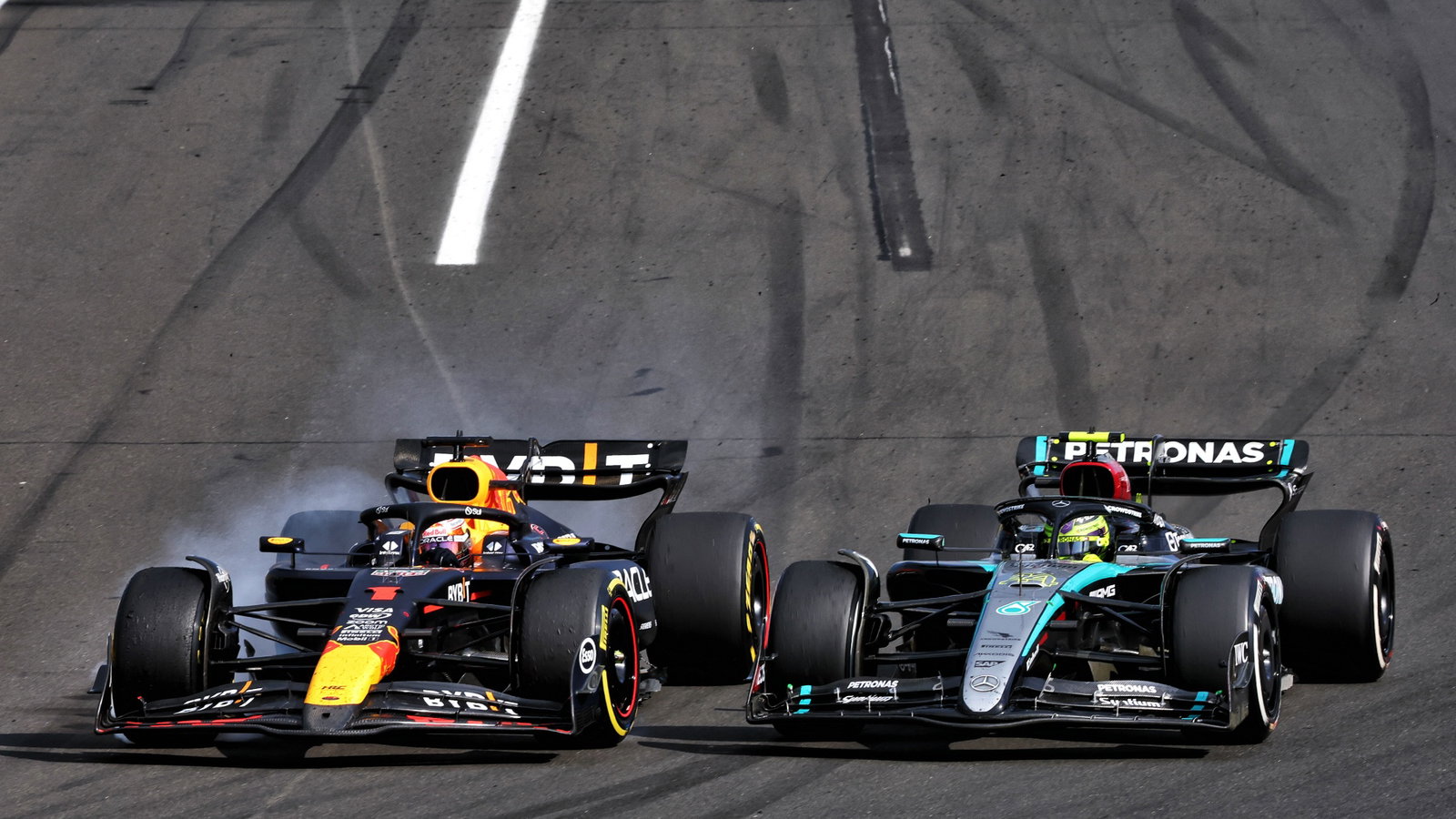 Max Verstappen (NLD) Red Bull Racing RB20 and Lewis Hamilton (GBR) Mercedes AMG F1 W15 collide. Formula 1 World
