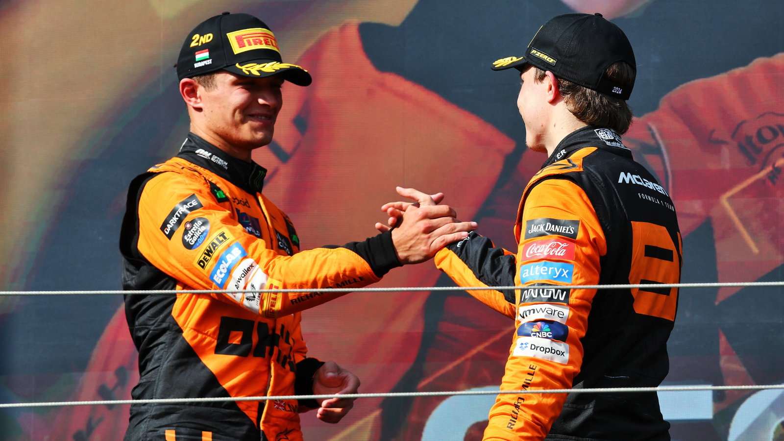 (L to R): Lando Norris (GBR) McLaren celebrates his second position with race winner and team mate Oscar Piastri (AUS)