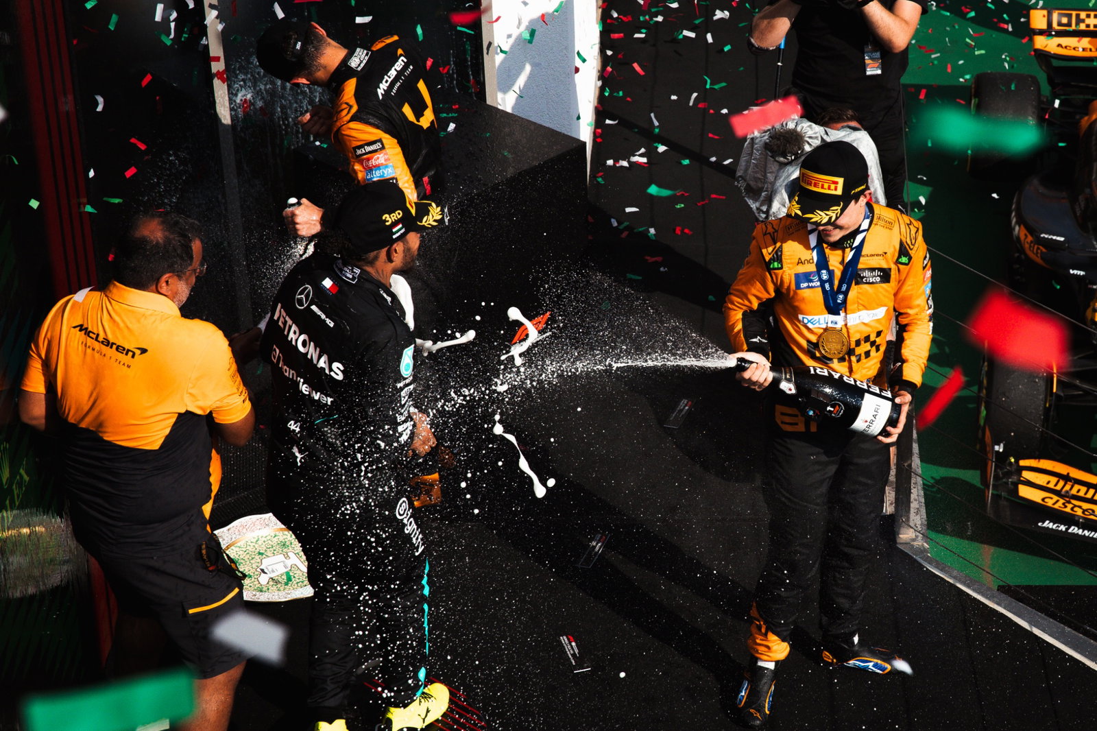 Race winner Oscar Piastri (AUS) McLaren celebrates on the podium wio second placed team mate Lando Norris (GBR) McLaren;