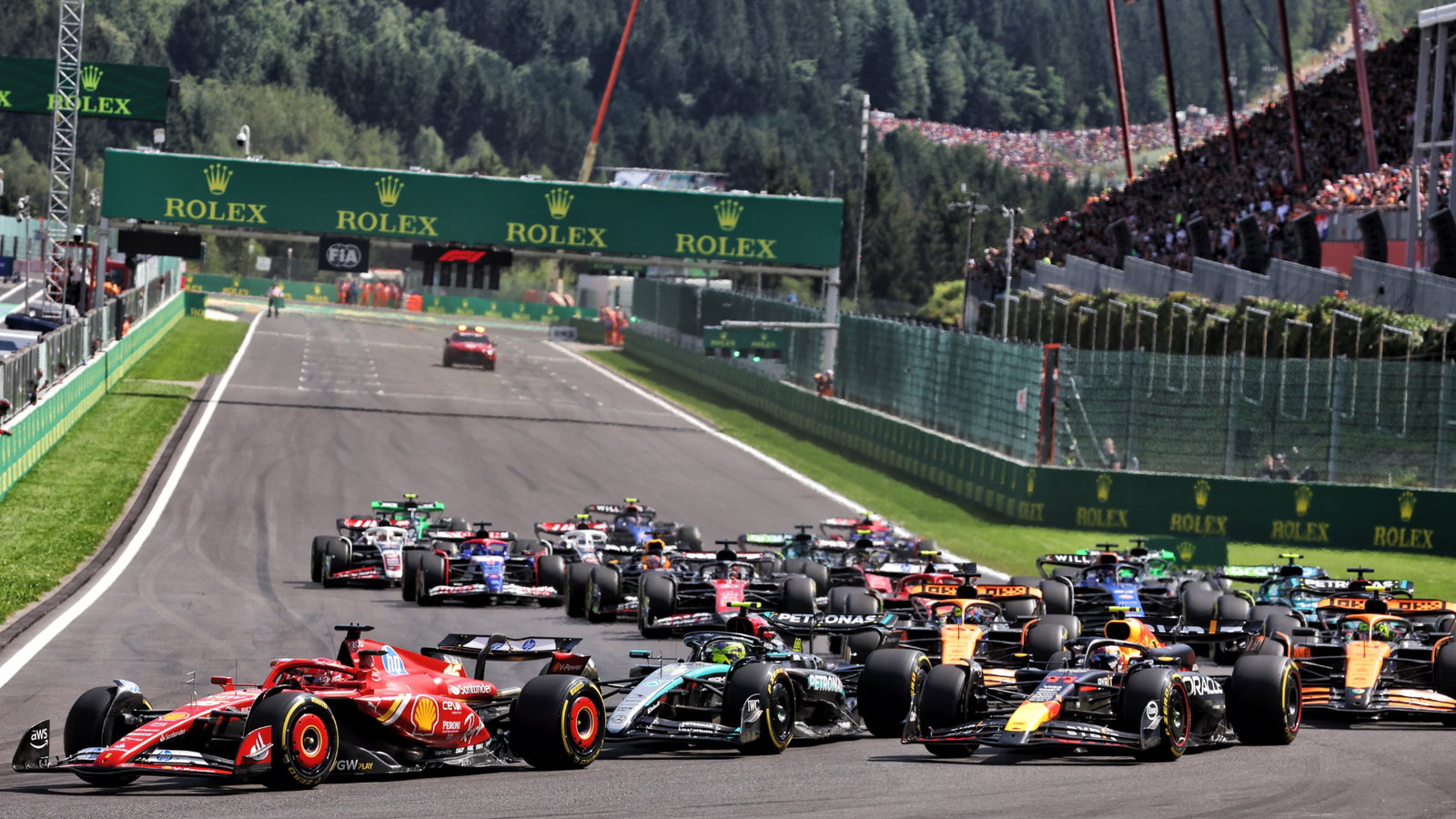 Charles Leclerc (MON) Ferrari SF-24 leads at the start of the race. Formula 1 World Championship, Rd 14, Belgian Grand