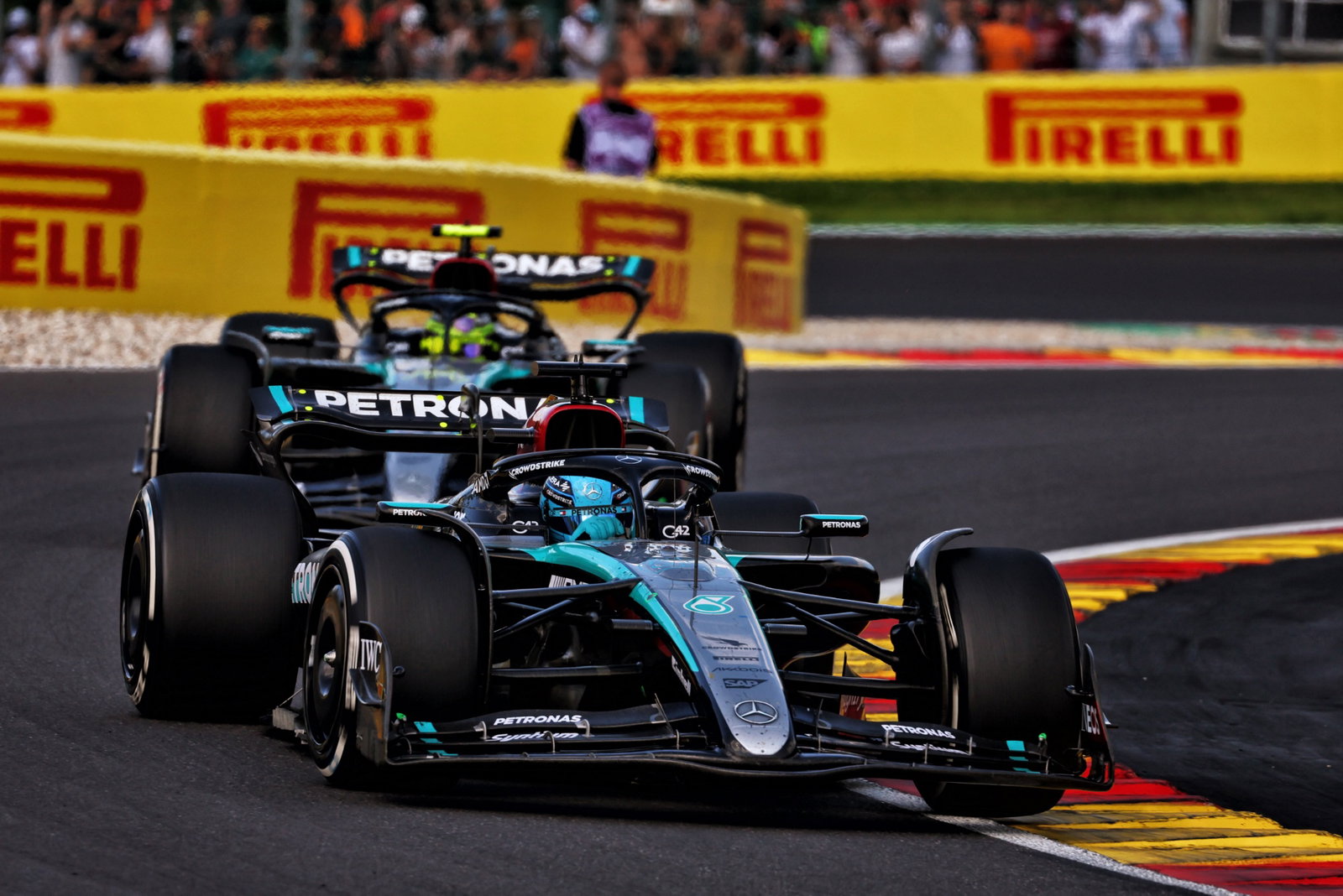 George Russell (GBR) Mercedes AMG F1 W15 leads team mate Lewis Hamilton (GBR) Mercedes AMG F1 W15. Formula 1 World