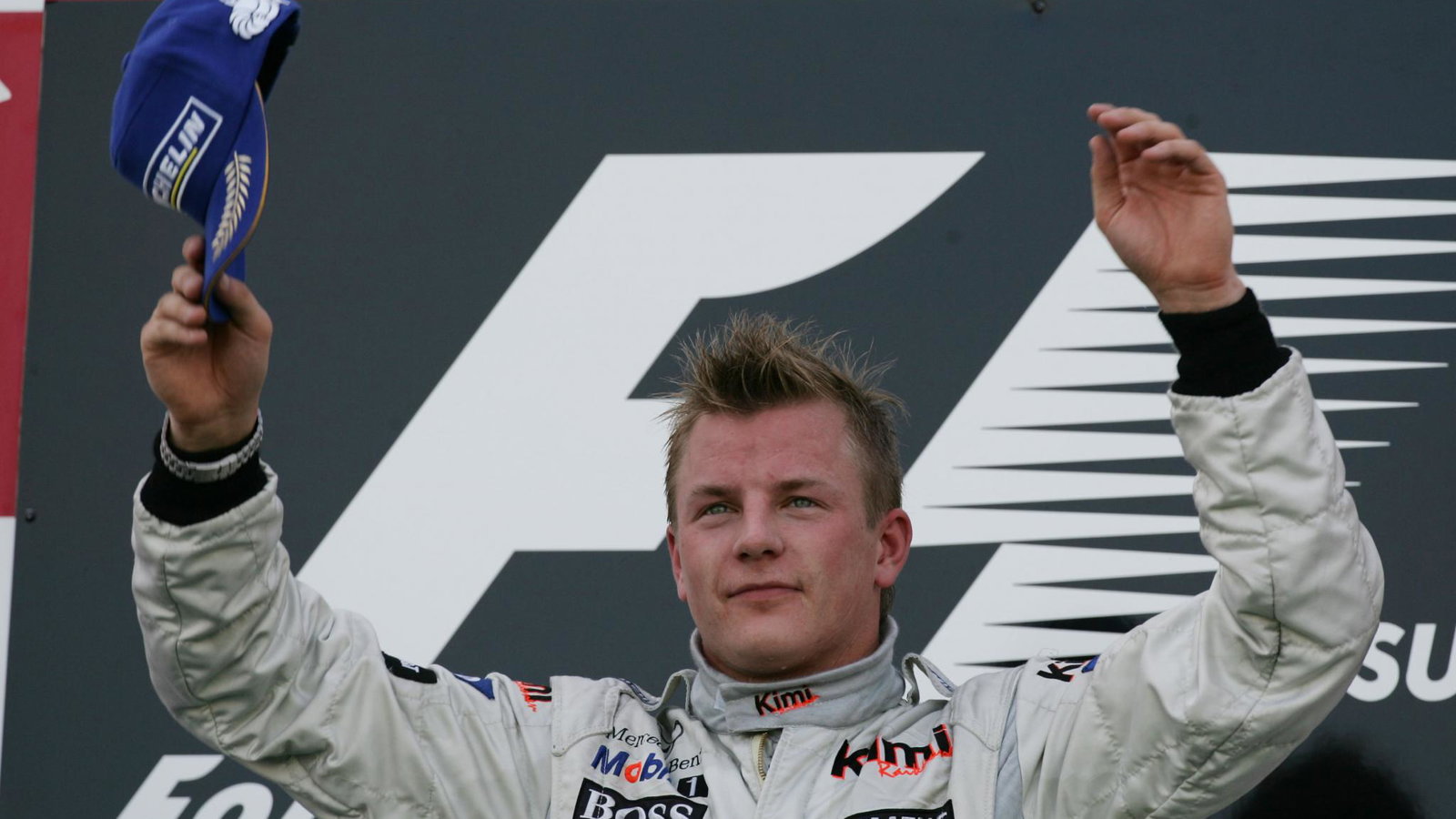 McLaren`s Kimi Raikkonen celebrates his win at Suzuka