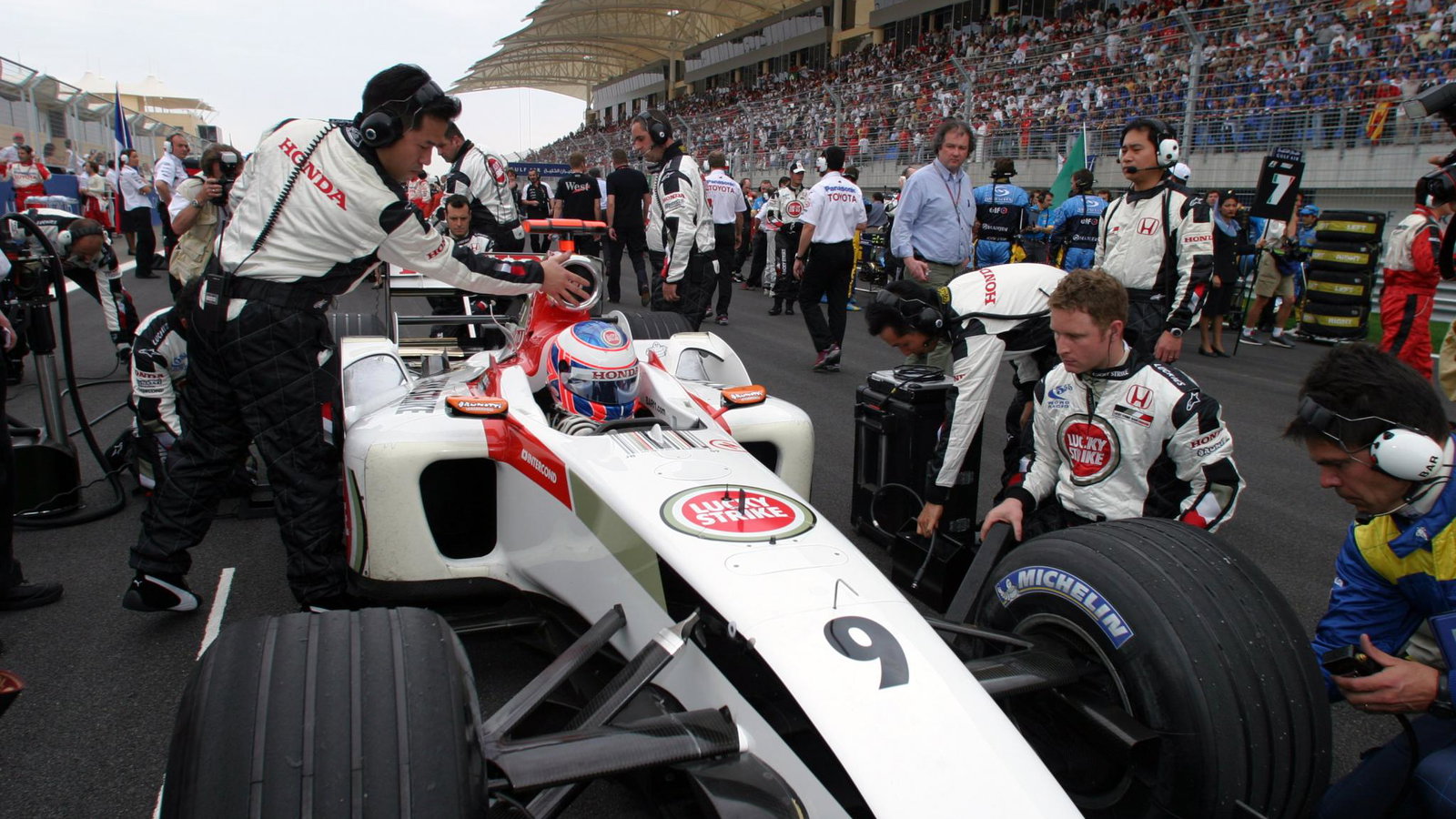 Jenson Button straps in for the 2004 Bahrain Grand Prix